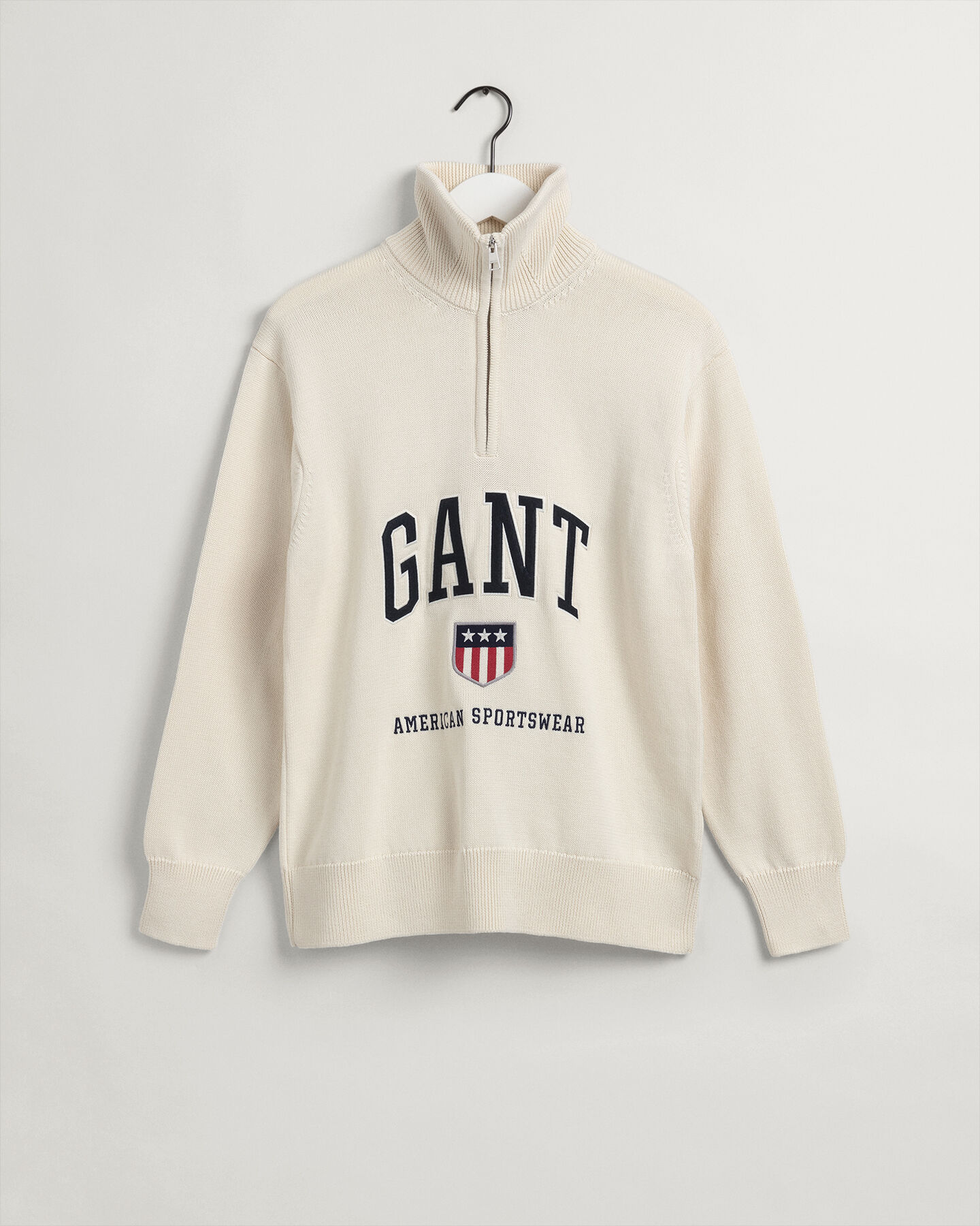 Retro Shield sweater med halv lynlås