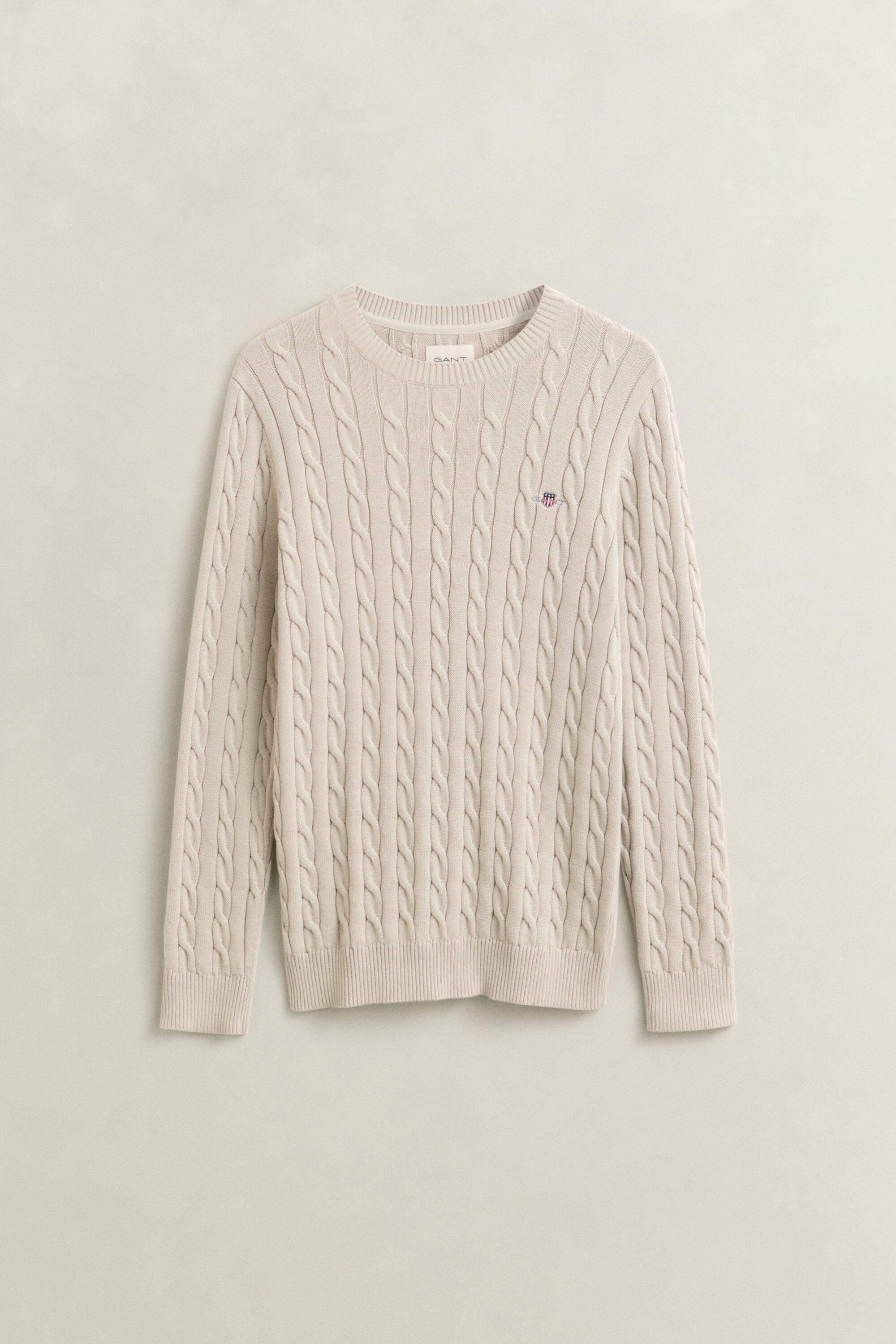 Crewneck sweater af bomuld med kabelstrik