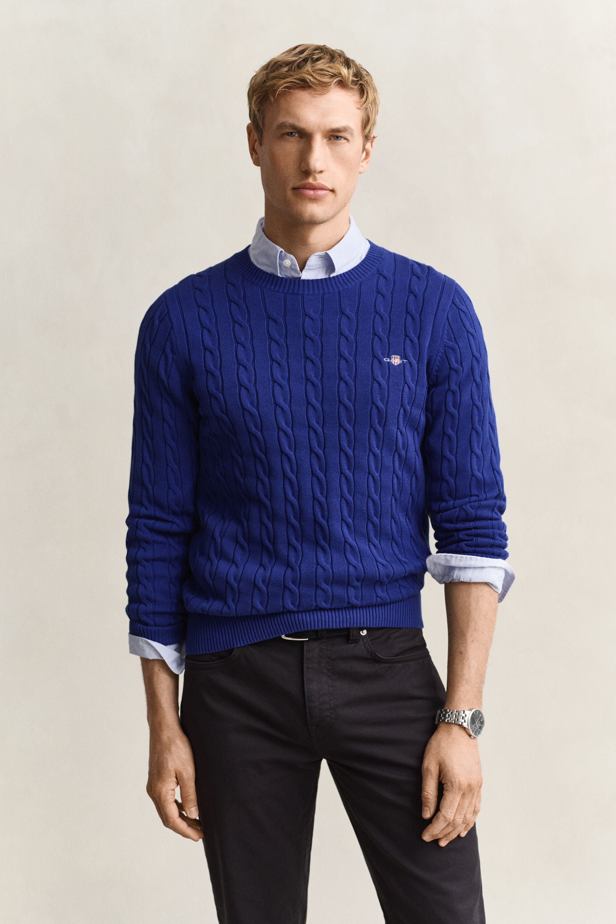 Crewneck sweater af bomuld med kabelstrik