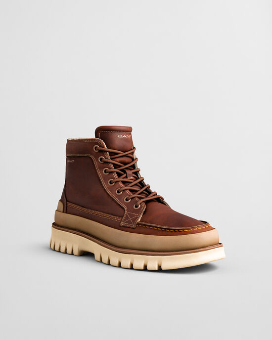 Nebrada mellemhøje læderstøvler