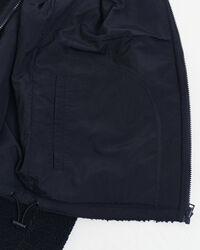 Vendbar fleece med lynlås