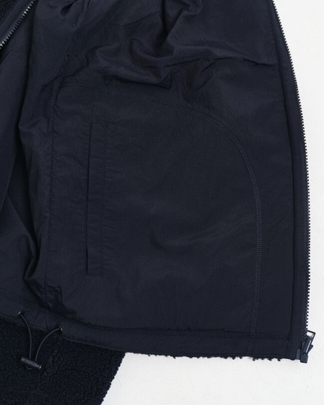 Vendbar fleece med lynlås