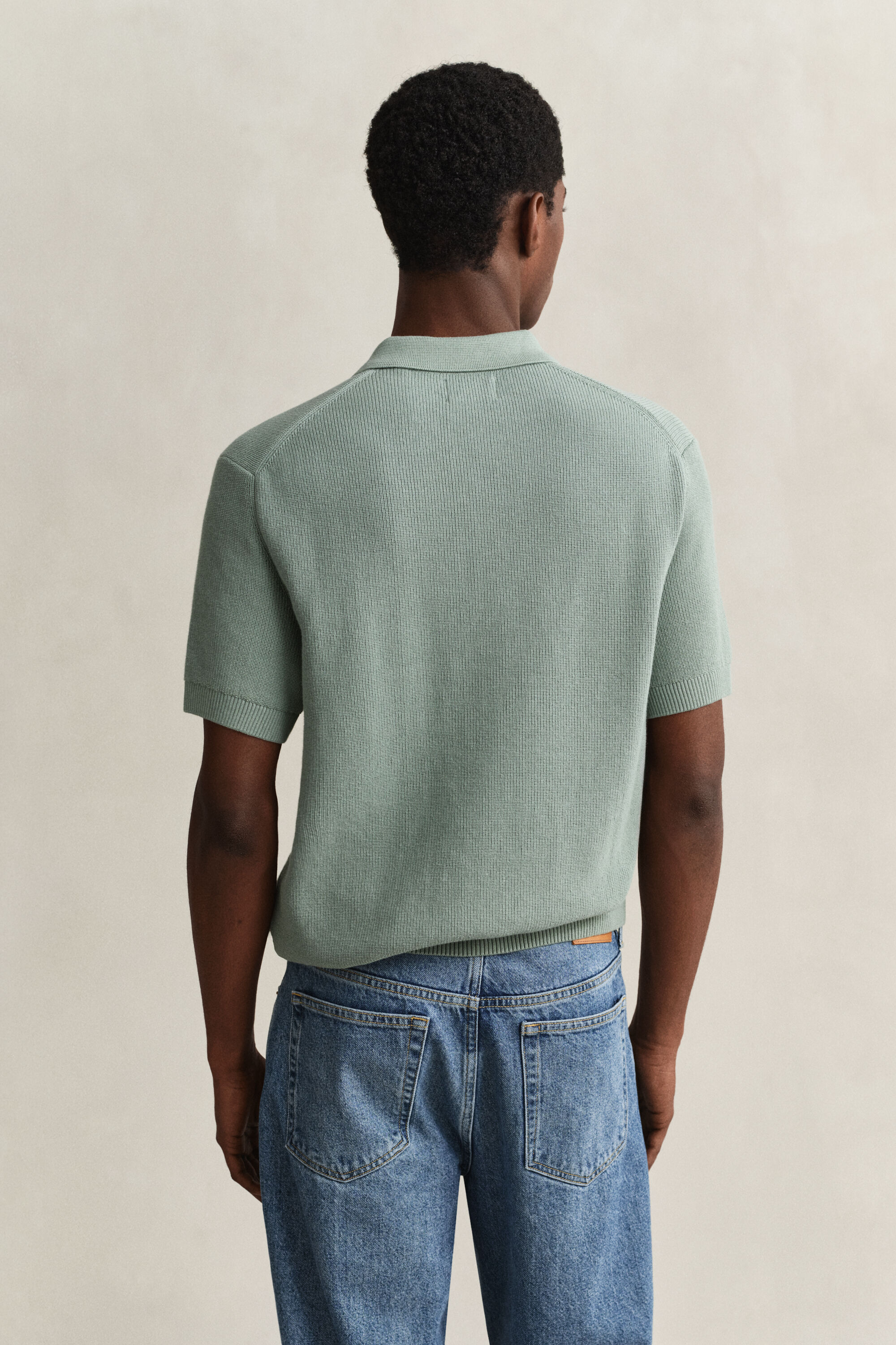 Ribstrikket polosweater i bomuld