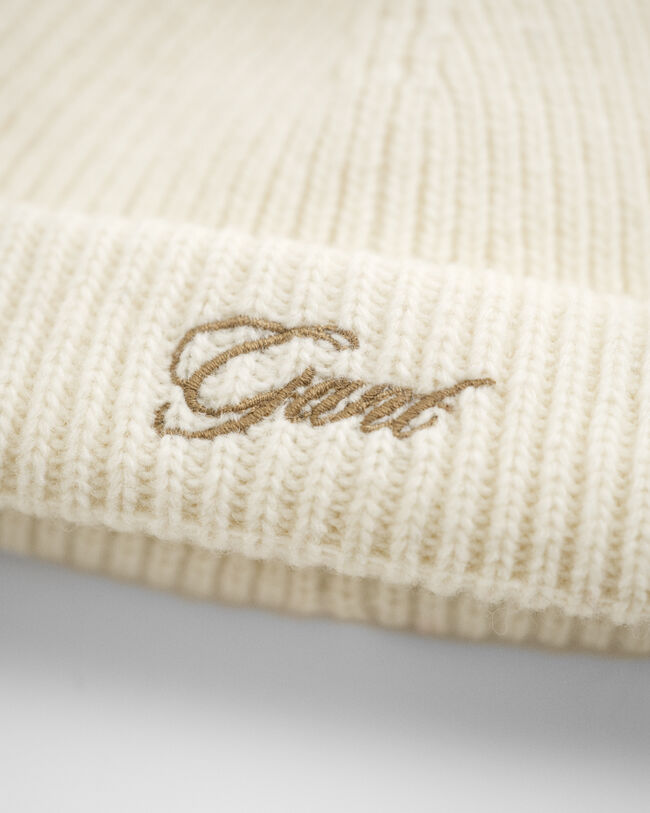 Baby beanie med øreklapper og pompon