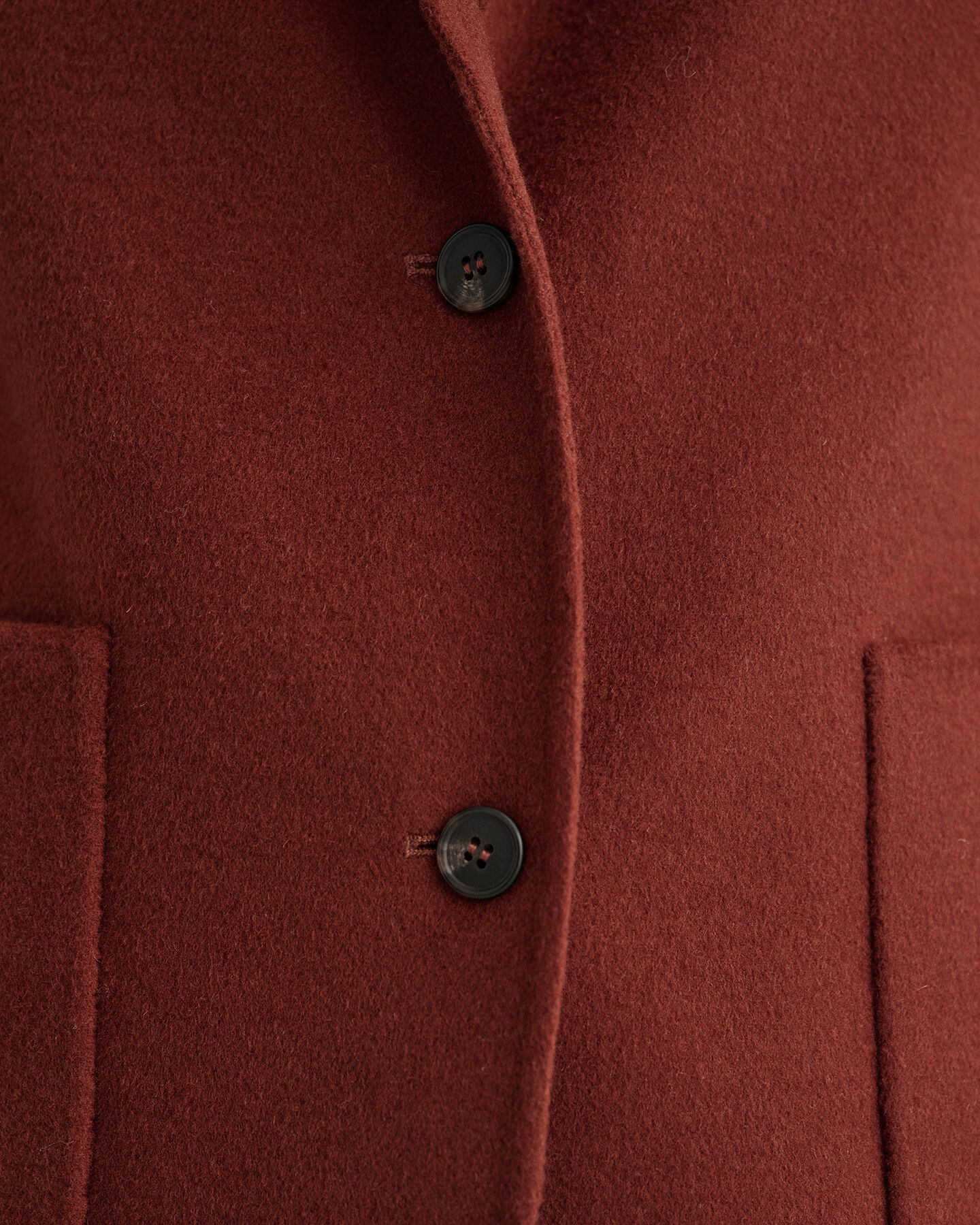 Håndsyet lige blazer