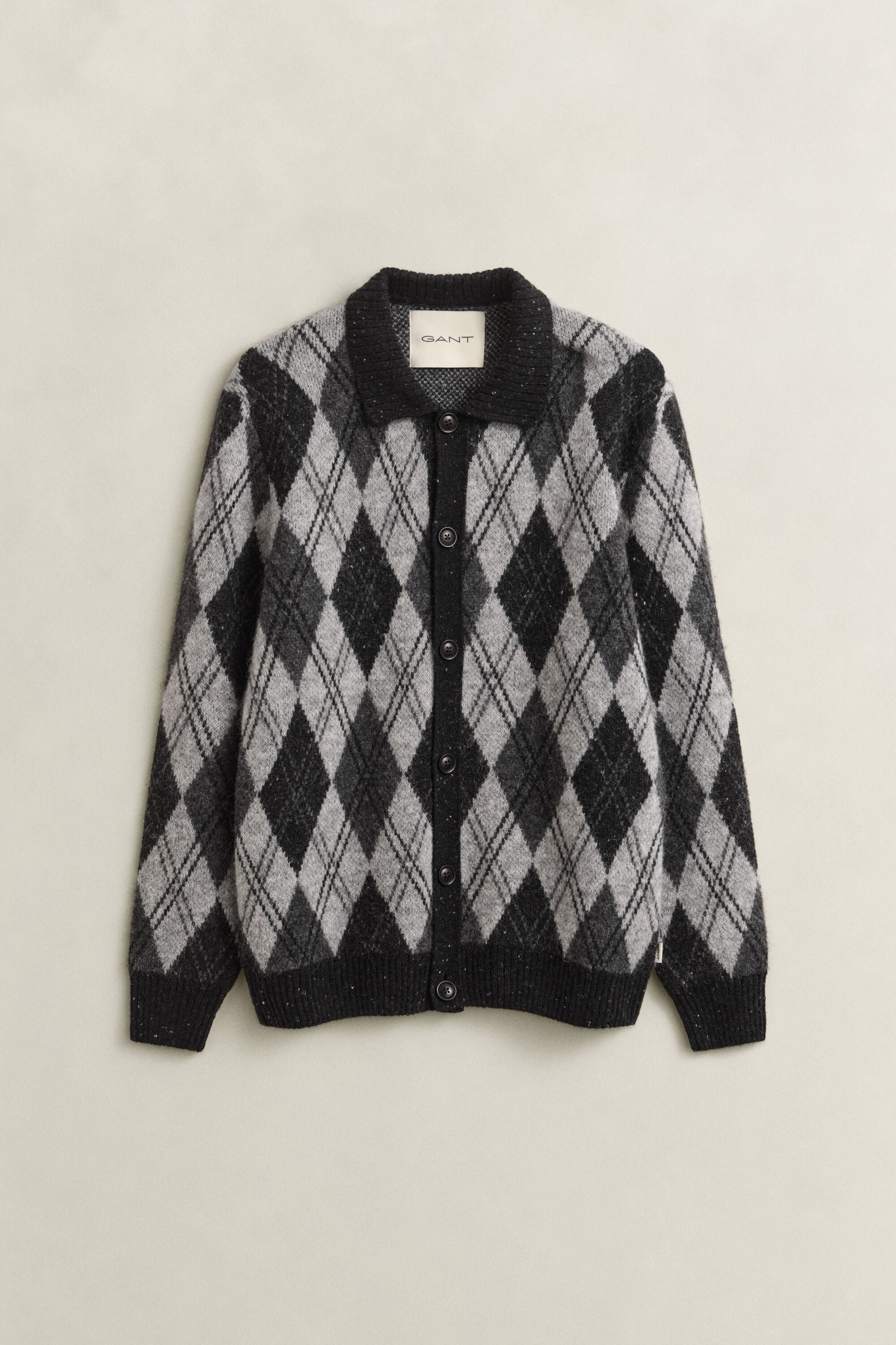 Argyle polo cardigan i en alpakauldblanding