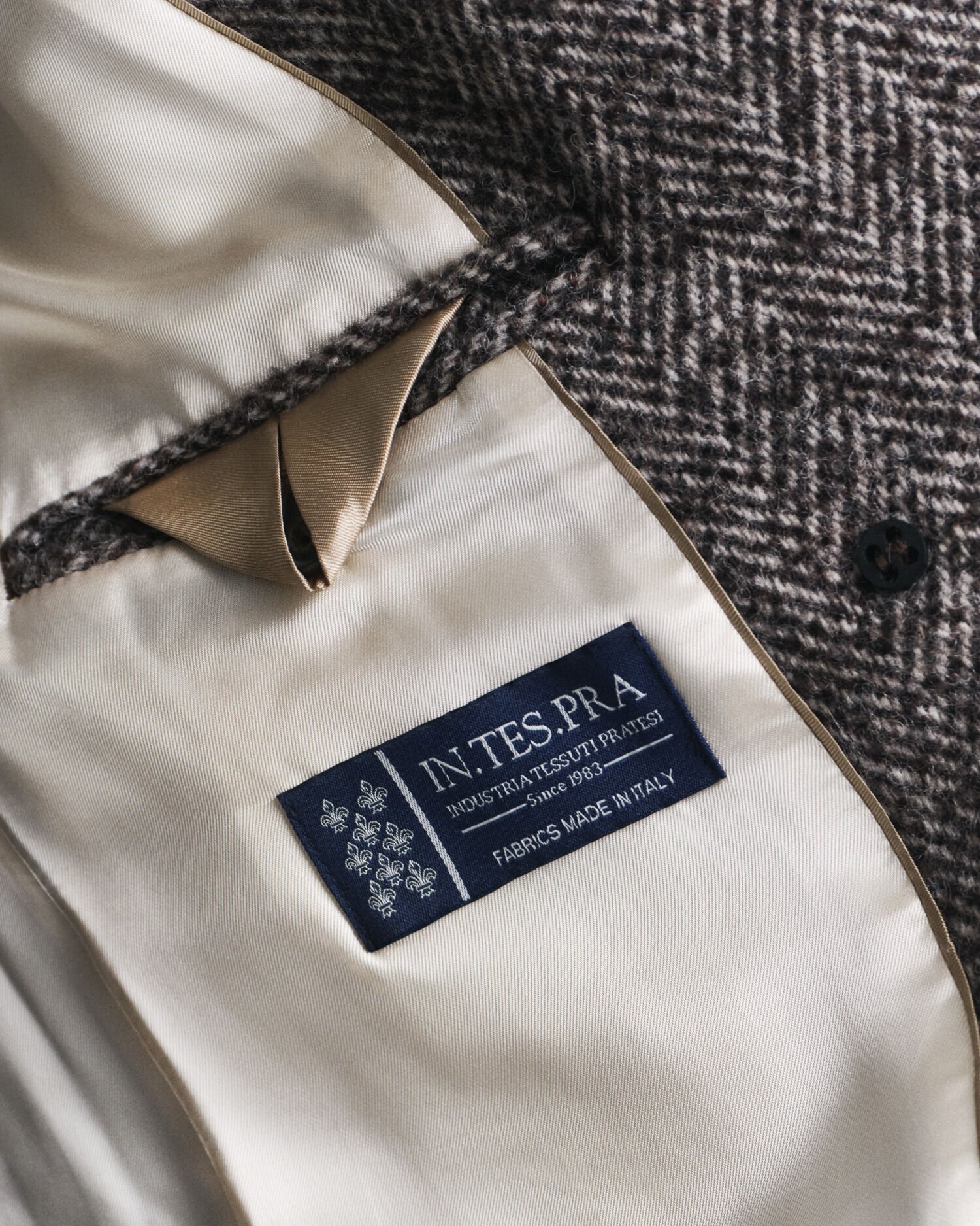 Sildebensmønstret overfrakke af uldblanding