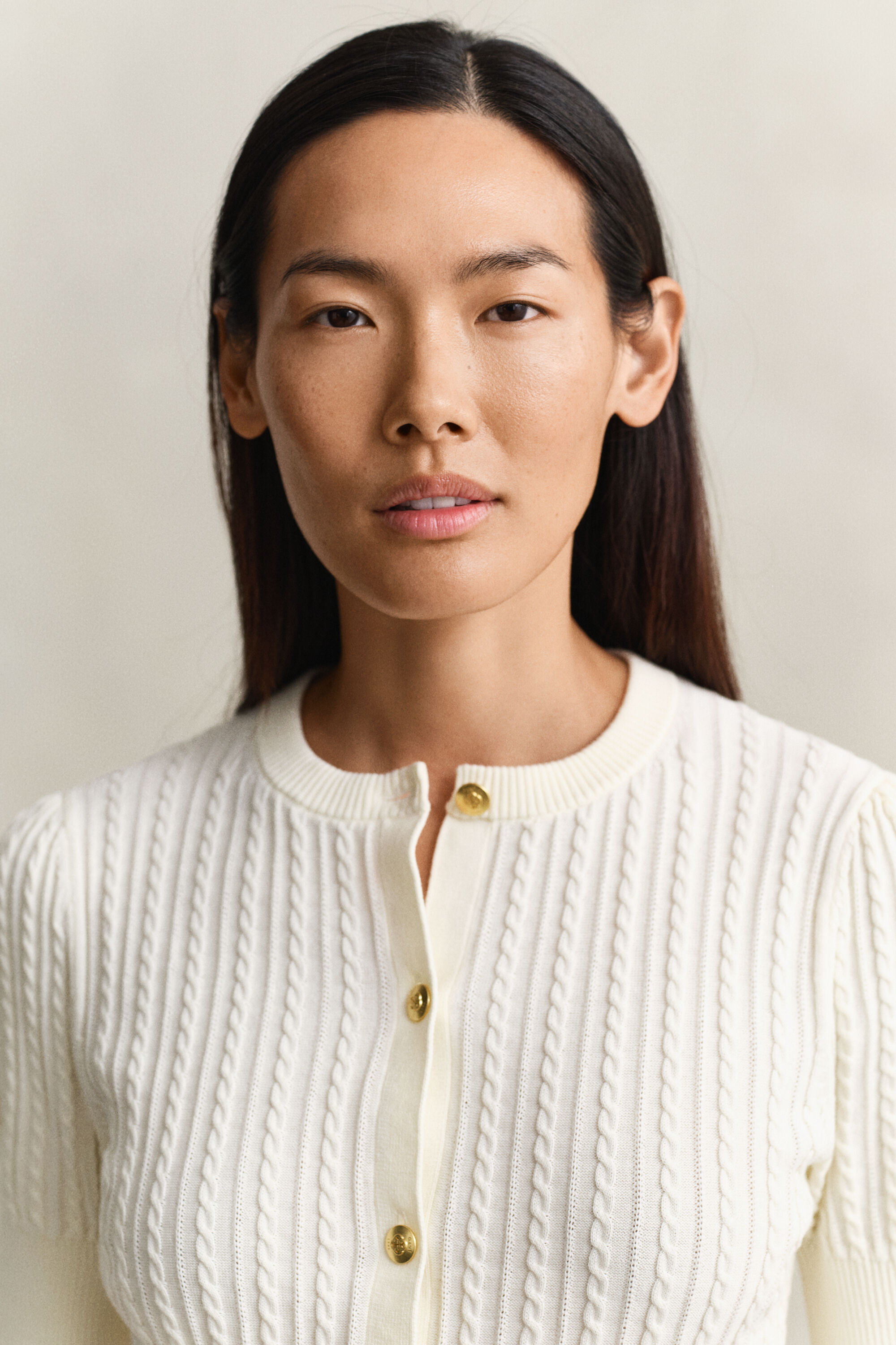 Cardigan af bomuld med kabelstrik