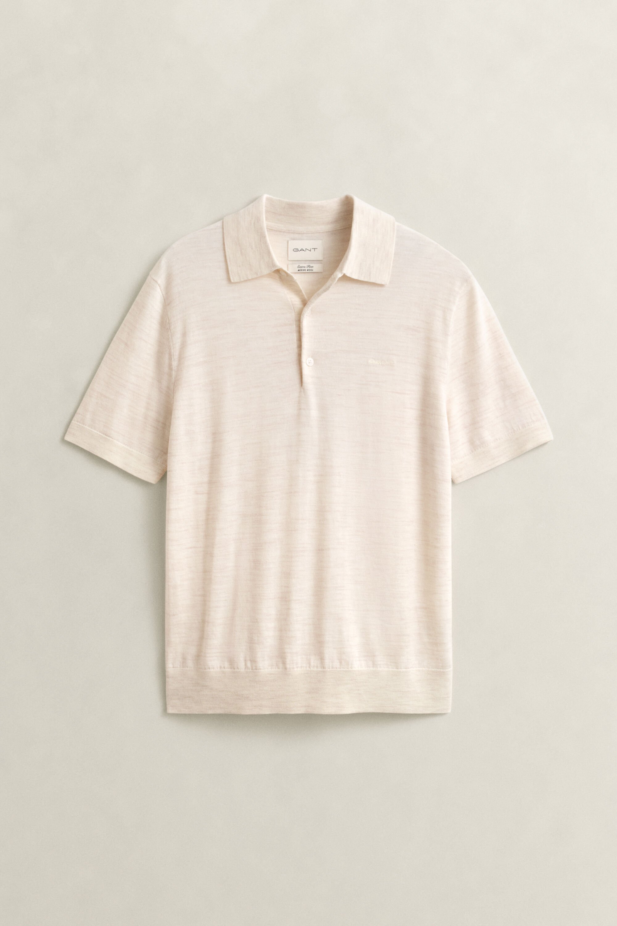 Kortærmet polosweater af ekstra fin merinould