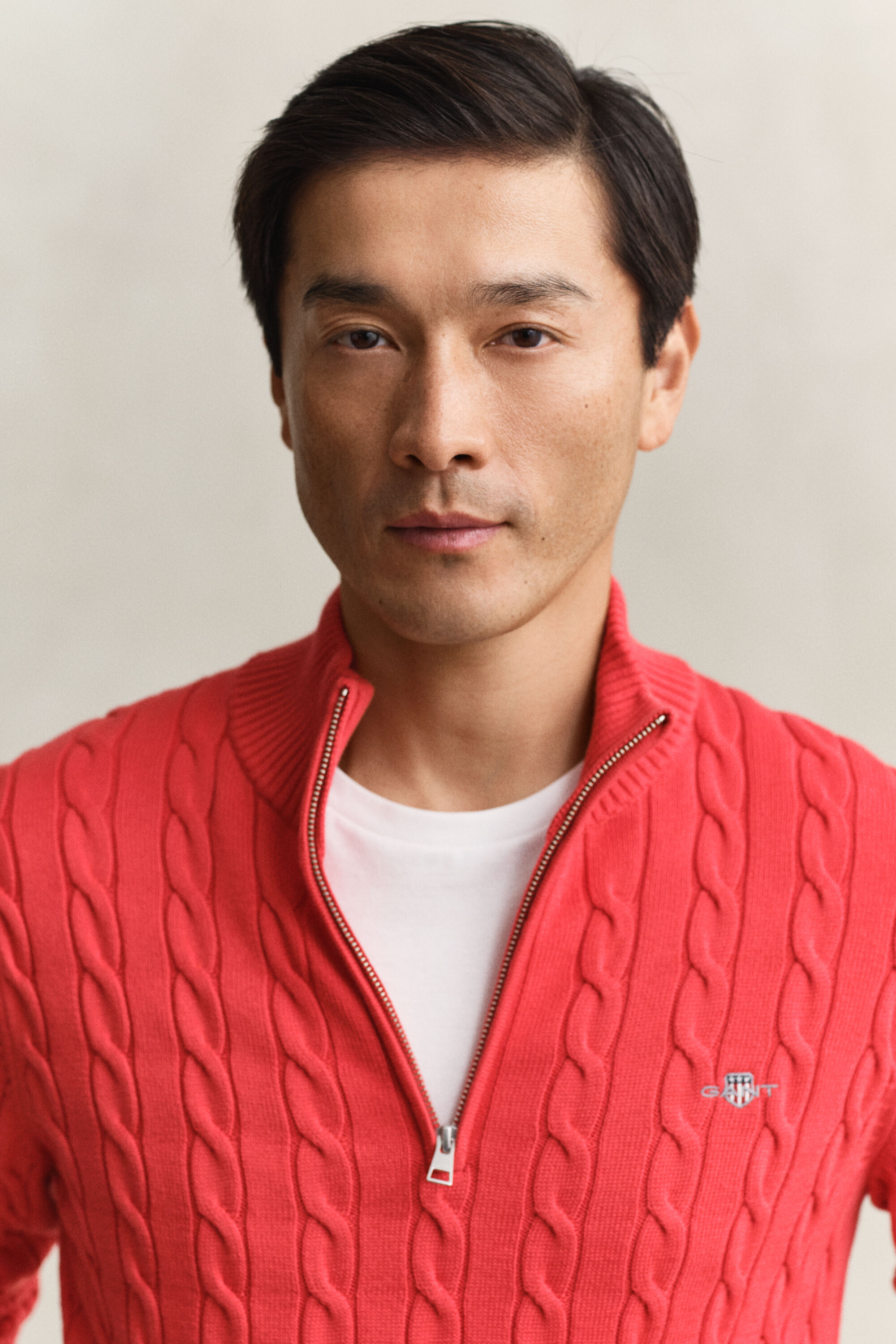 Kabelstrikket sweater af bomuld med halv lynlås