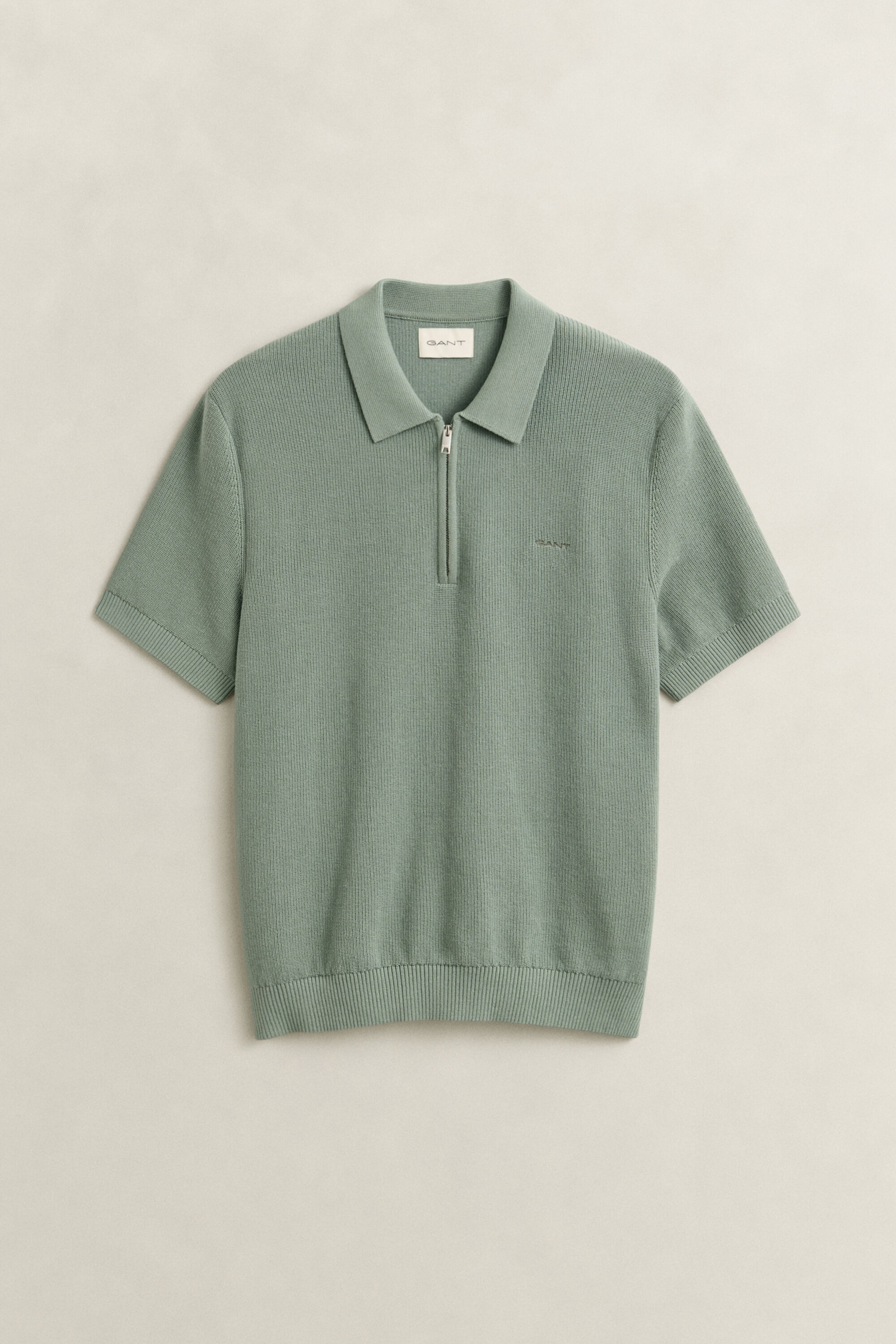 Ribstrikket polosweater i bomuld
