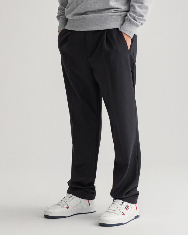 Fluid bukser med l&aelig;g