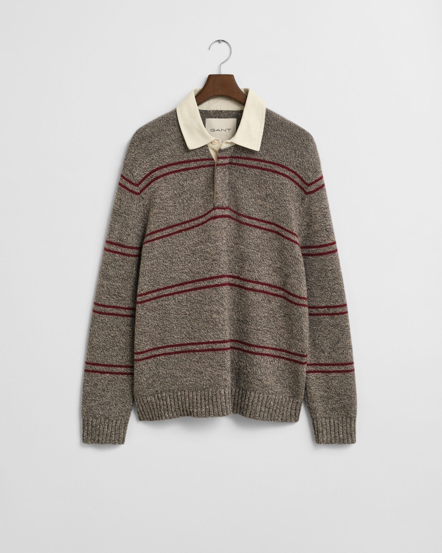 Stribet polosweater af uldblanding