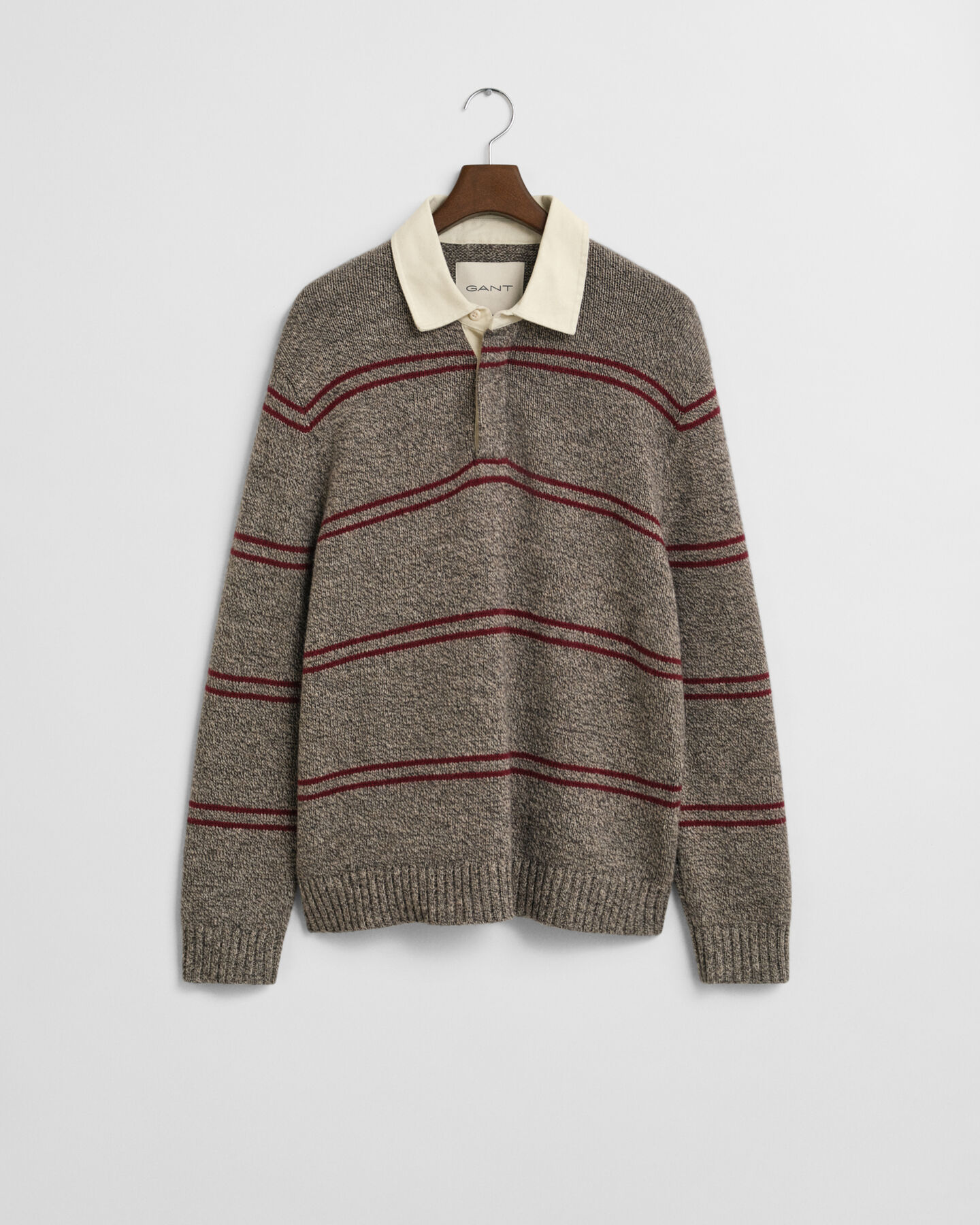 Stribet polosweater af uldblanding