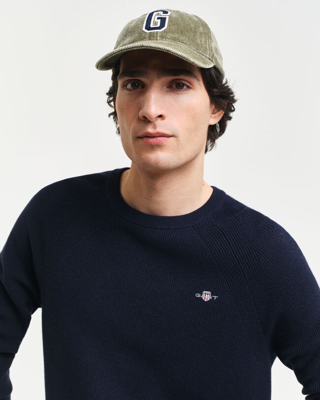 Ribstrikket crewneck sweater af bomuld og uld