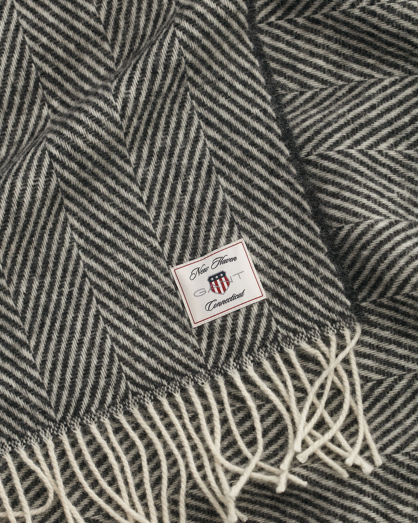 Sildebensmønstret uldtæppe