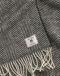 Sildebensmønstret uldtæppe