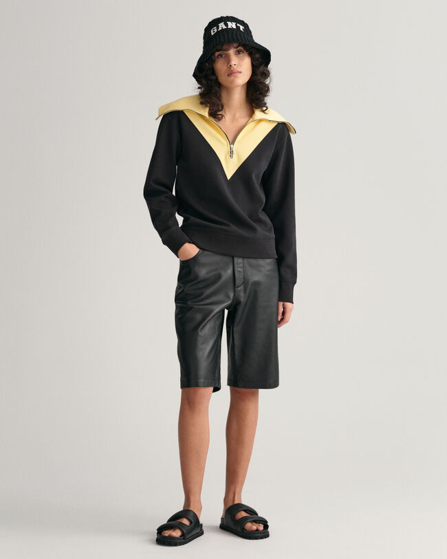 Sweatshirt med halv lynl&aring;s og farveblokke