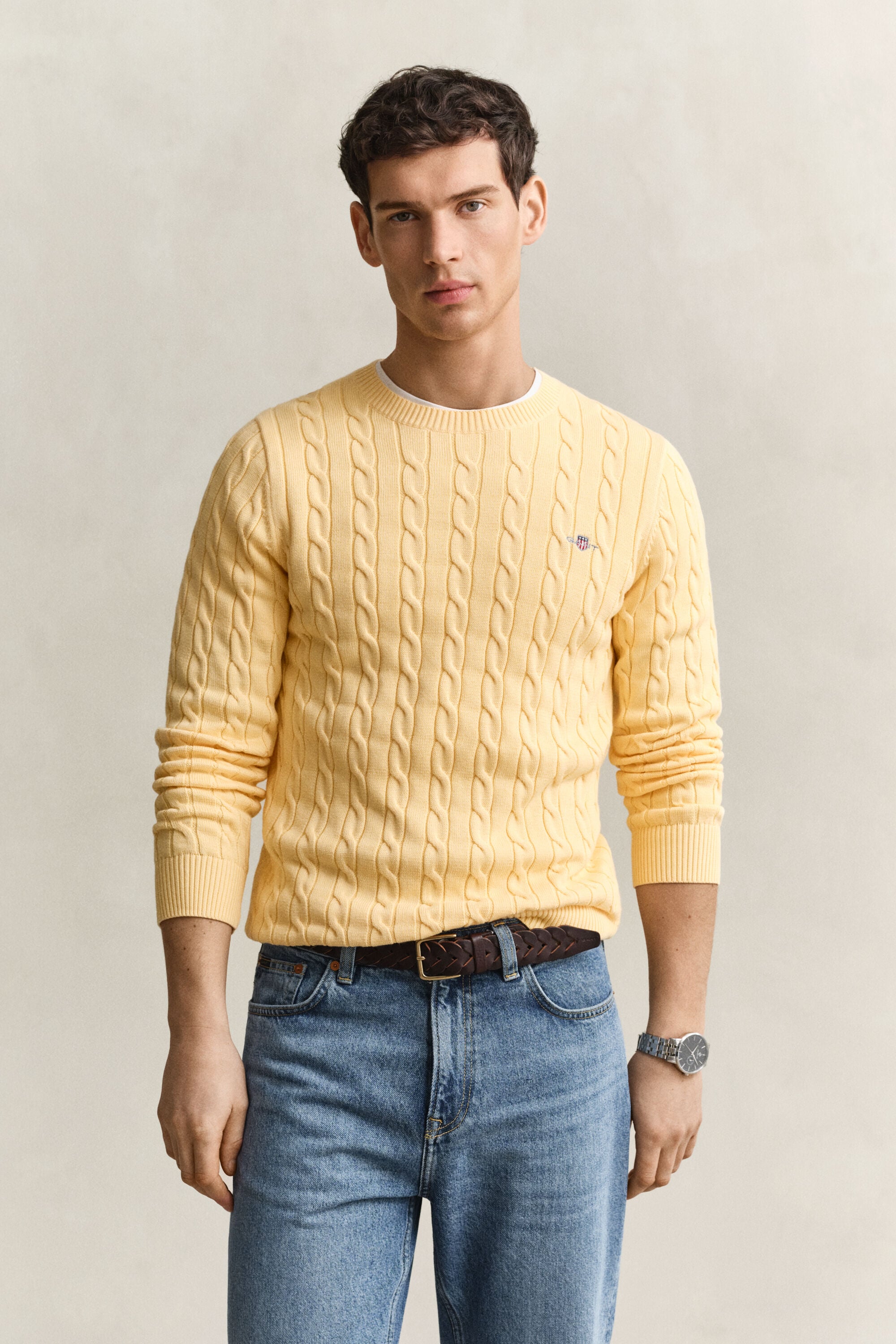 Crewneck sweater af bomuld med kabelstrik