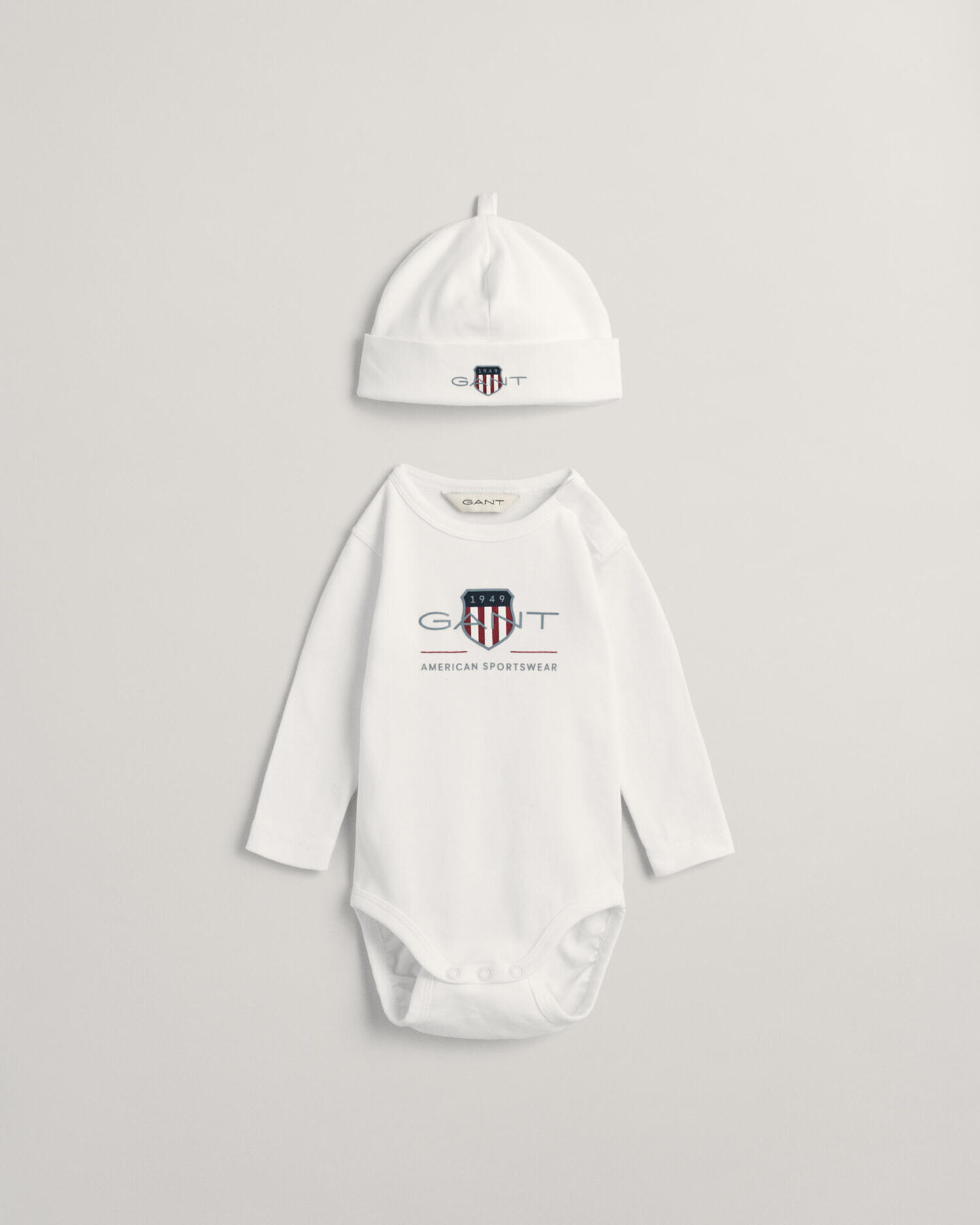 Baby Archive Shield bodysuit og beanie