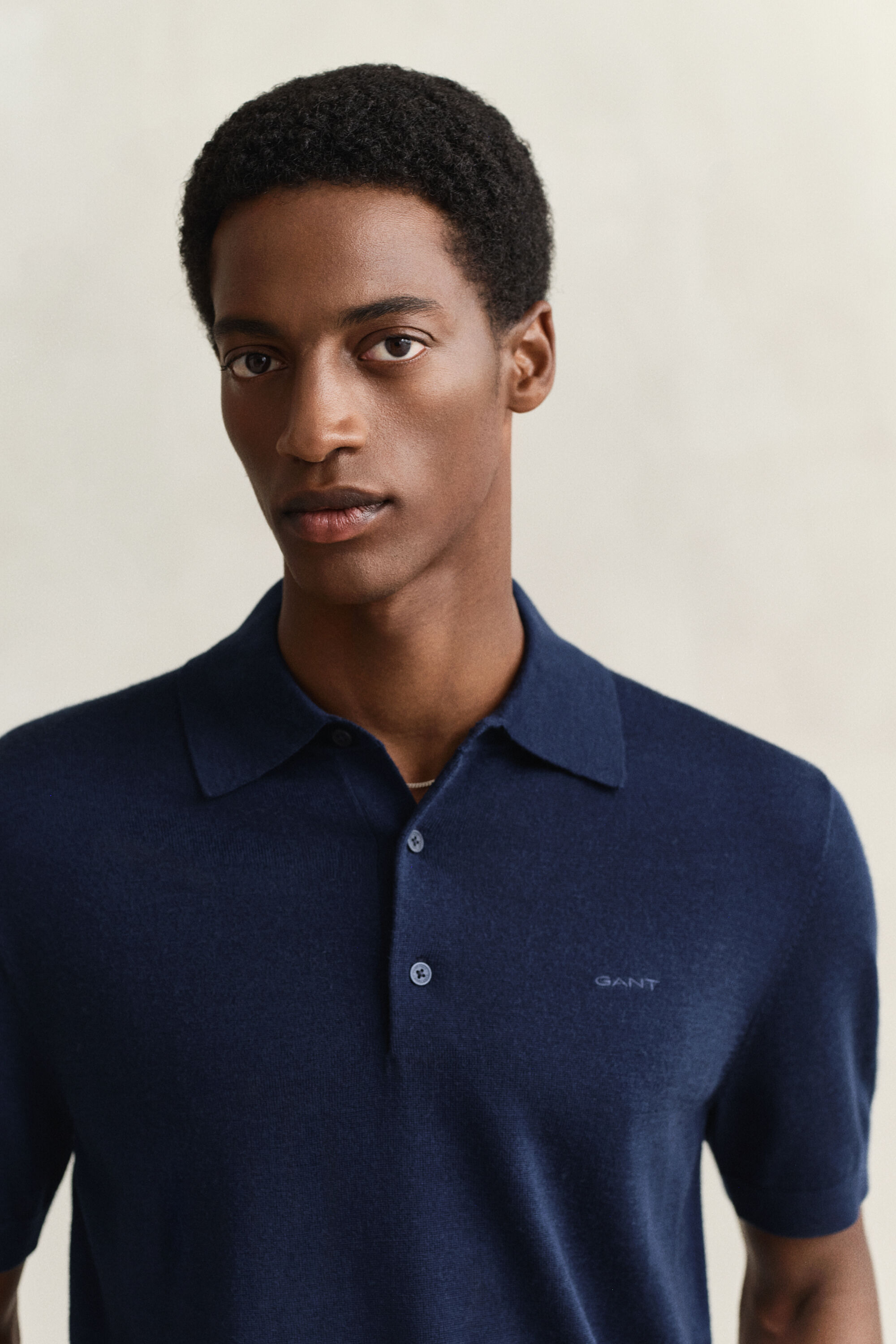 Kortærmet polosweater af ekstra fin merinould