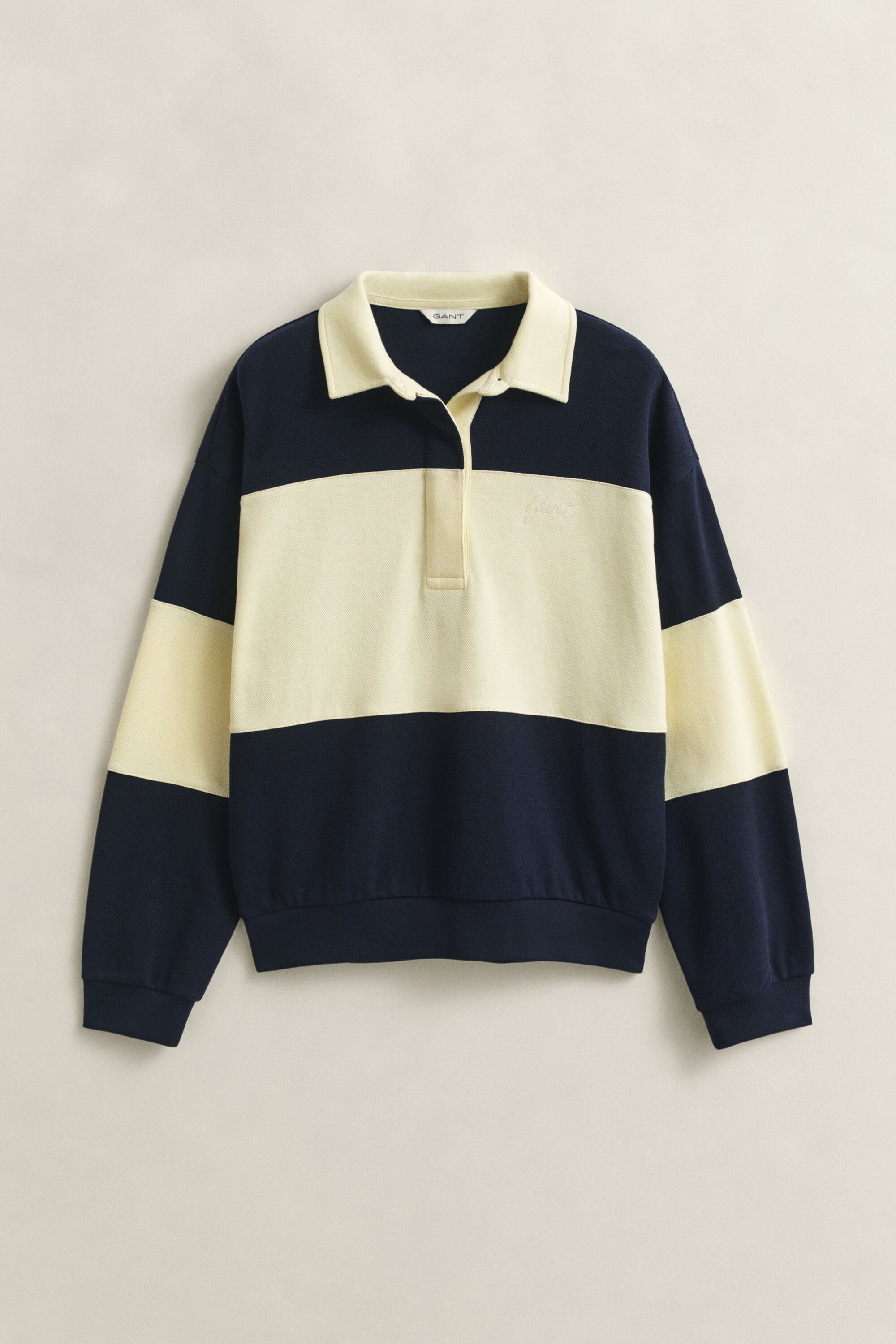 Piqué Rugger med struktur og farveblokke