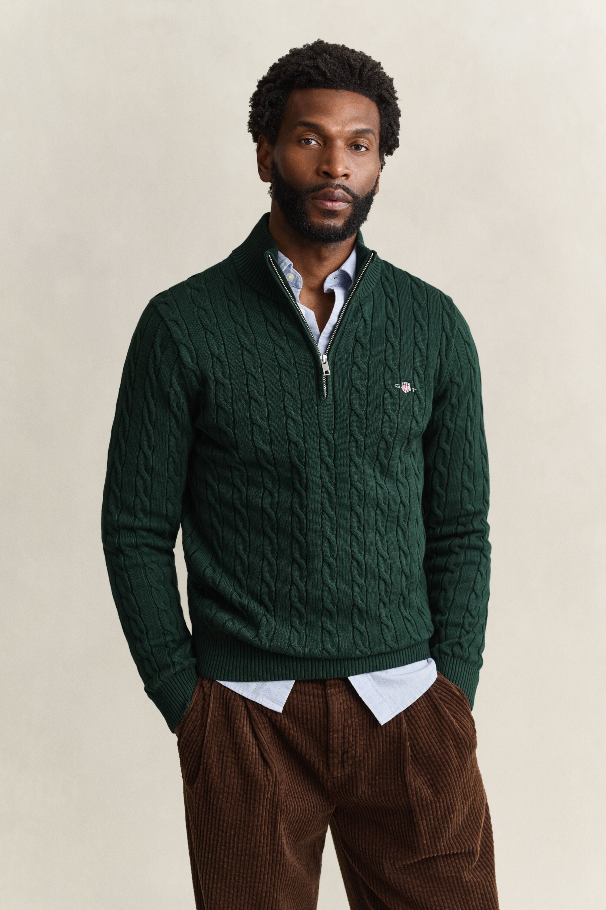 Kabelstrikket sweater af bomuld med halv lynlås