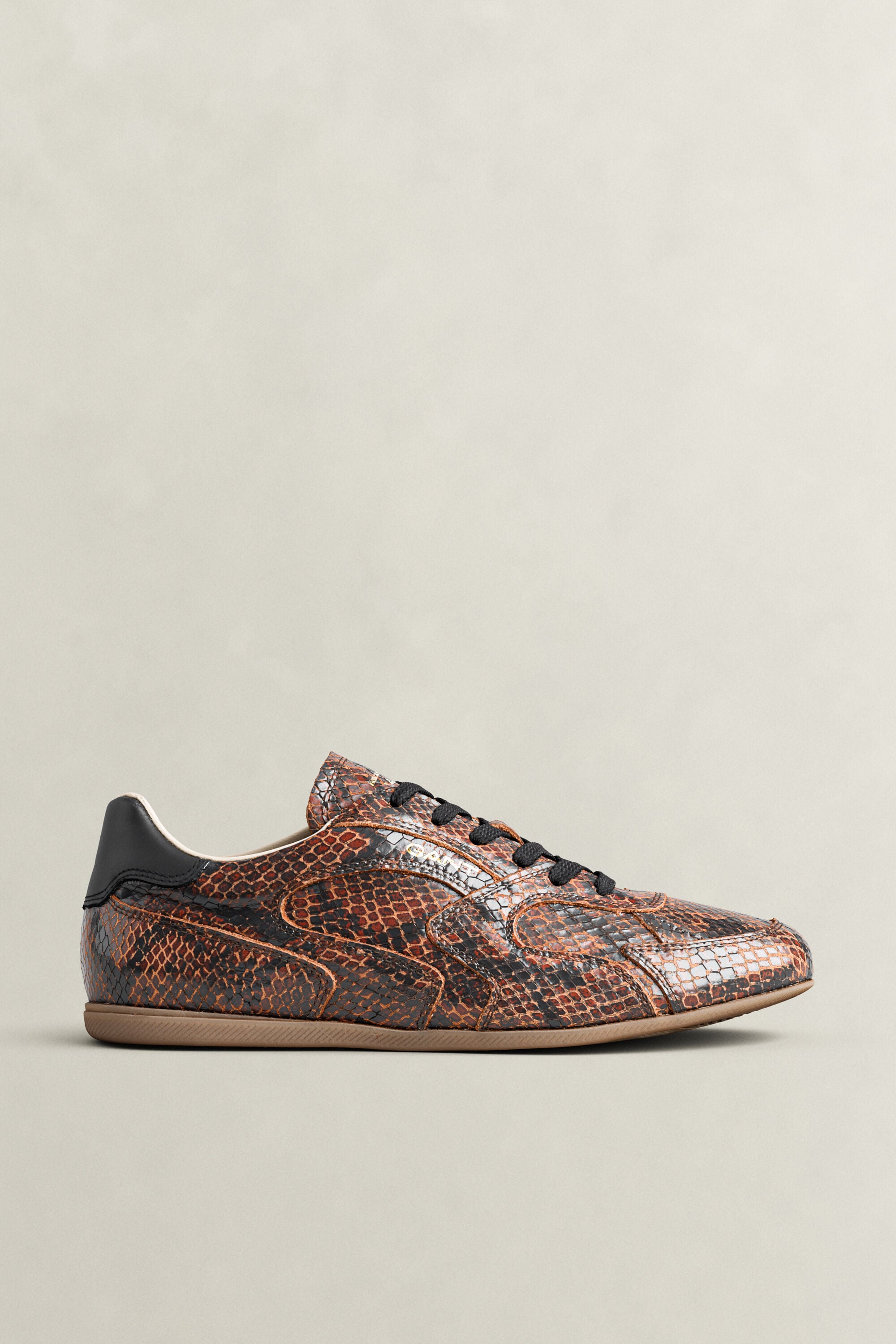Sperly lædersneakers med prægning af slangeskind