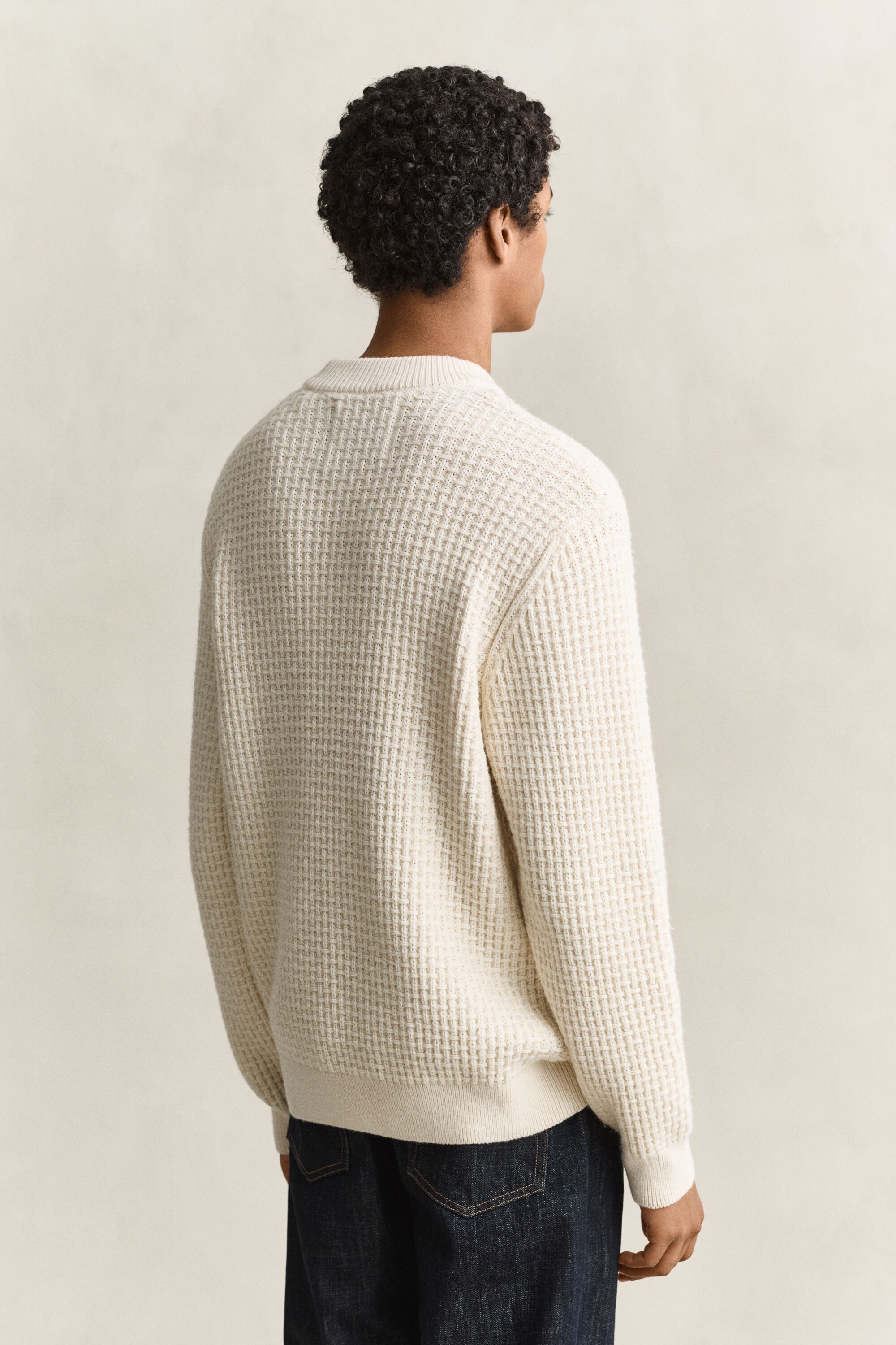 Tekstureret sweater i bomuld og uld med mock-neck