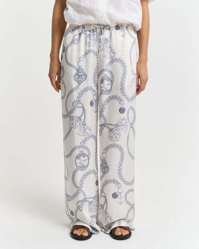 Relaxed fit bukser med l&oslash;besnor og sejlads-tryk