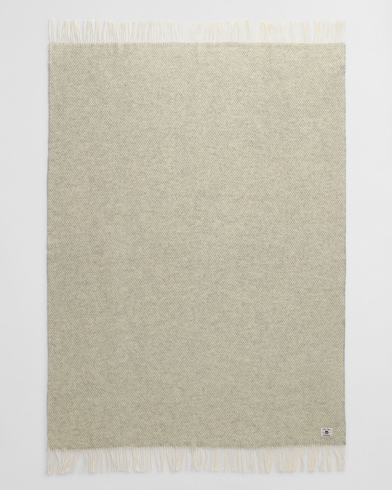 Sildebensmønstret uldtæppe