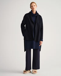 Håndsyet blazer med bælte