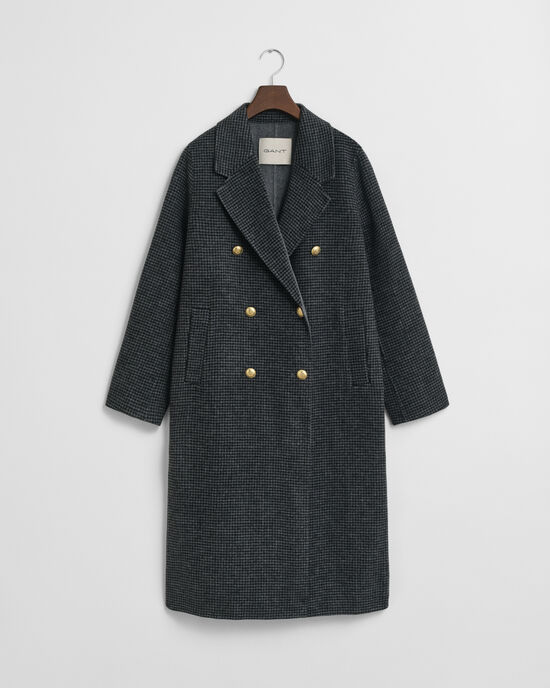 Ternet håndsyet frakke