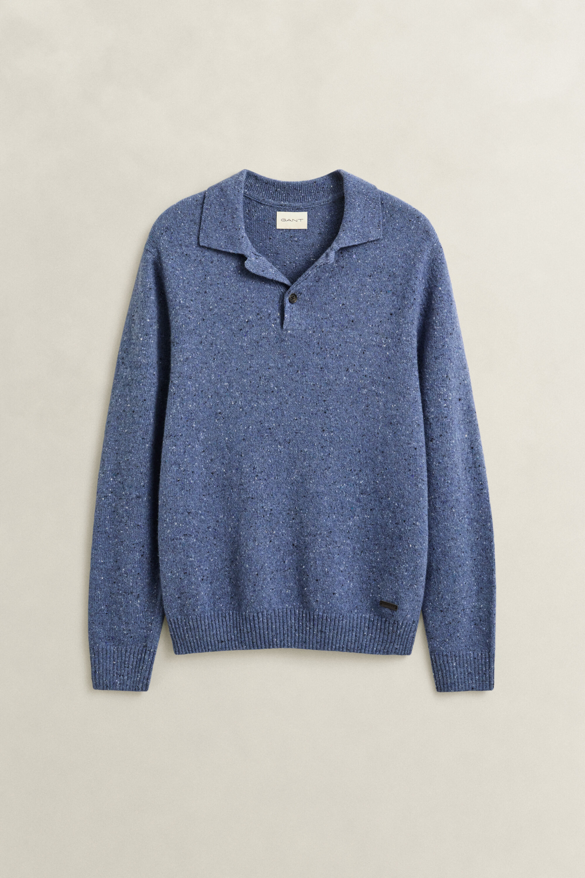 Polosweater i uldblanding med nister