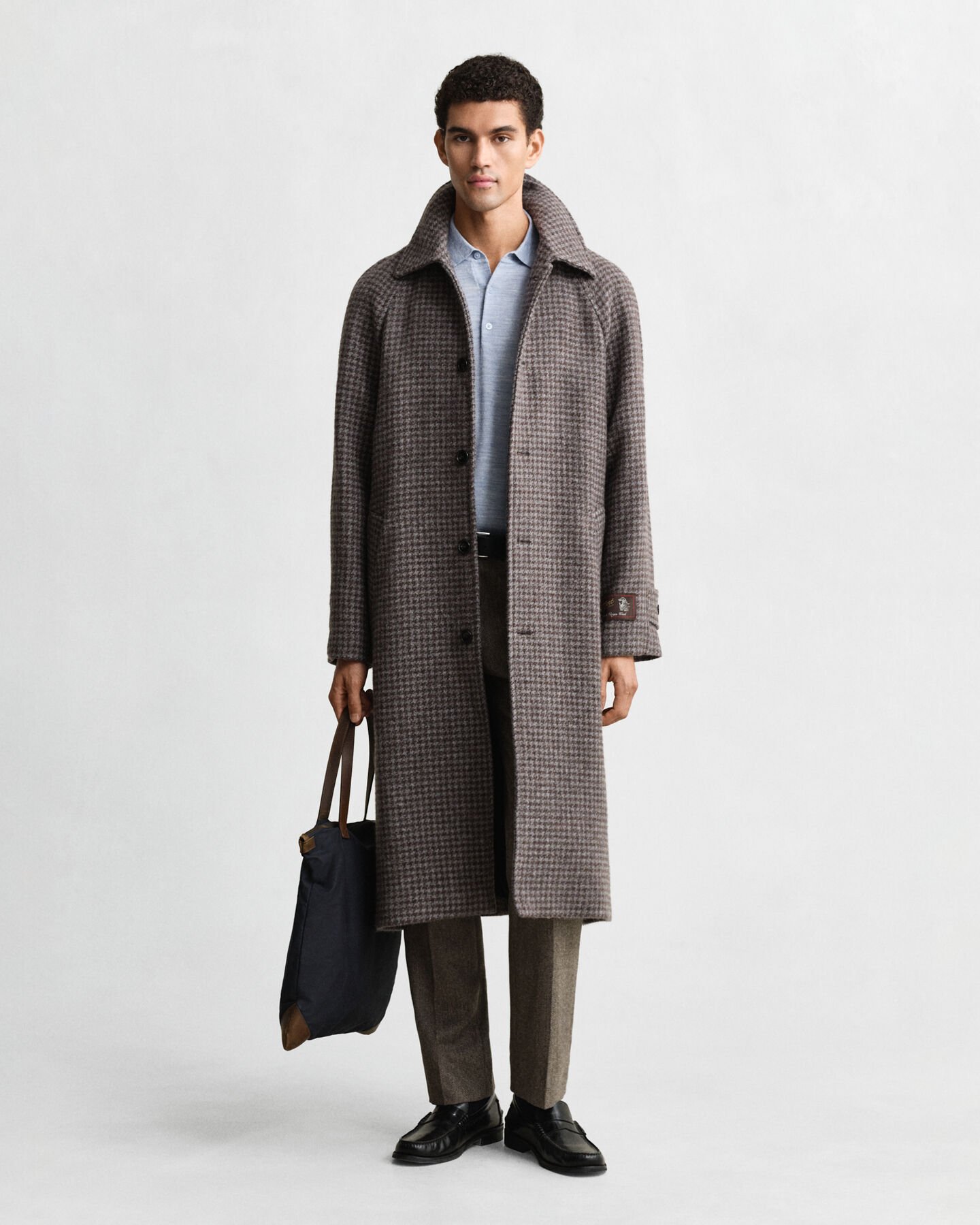 Kort&aelig;rmet polosweater af ekstra fin merinould