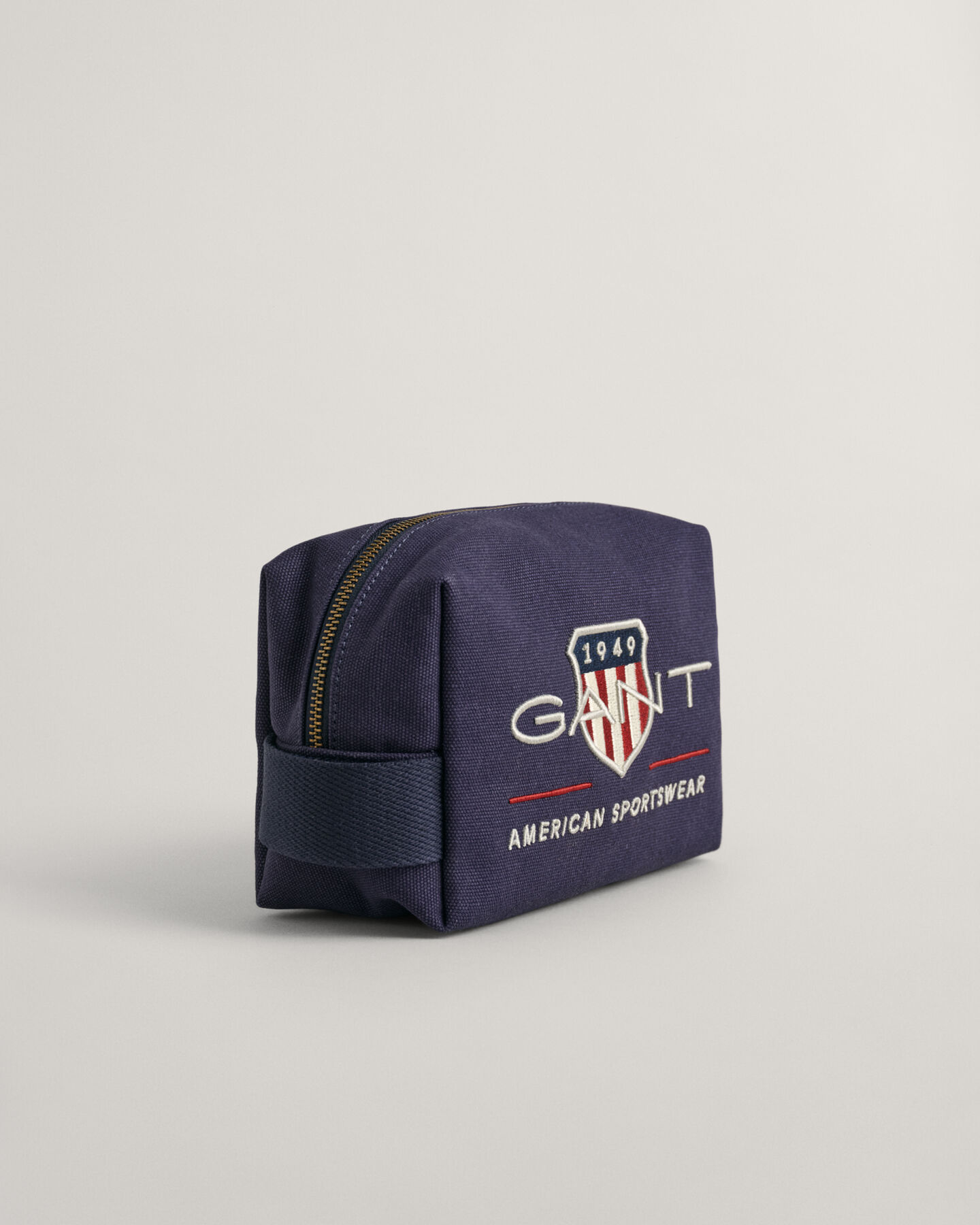 Farvet Shield toilettaske