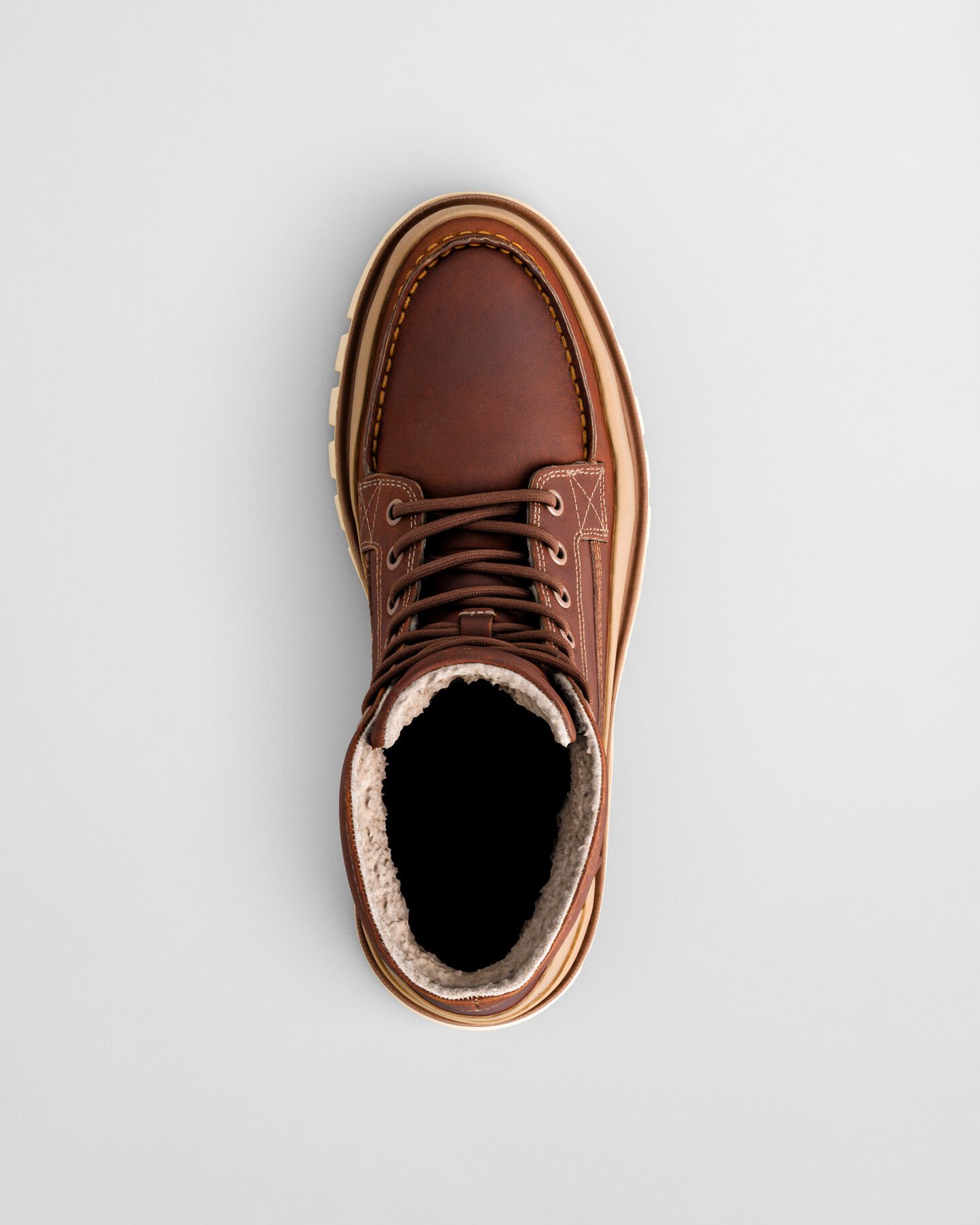 Nebrada mellemhøje læderstøvler