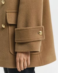 Mellemlang sømandsjakke i uld