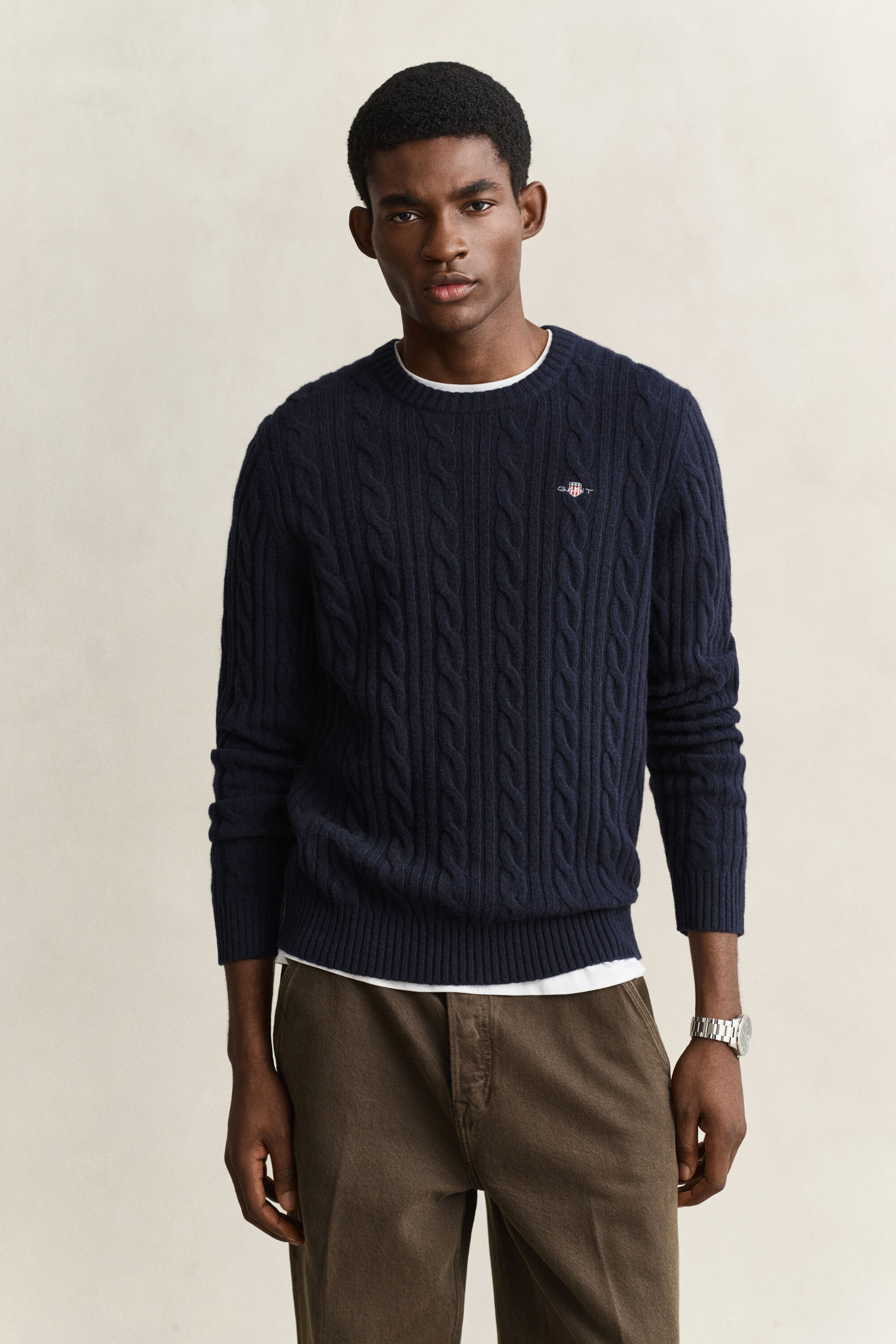 Crewneck sweater af lammeuld med kabelstrik