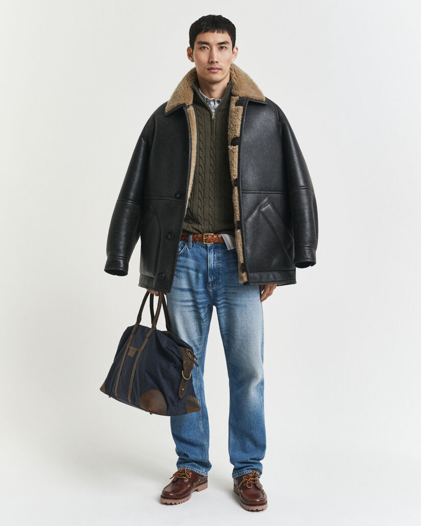 Kabelstrikket sweater af bomuld med halv lynlås