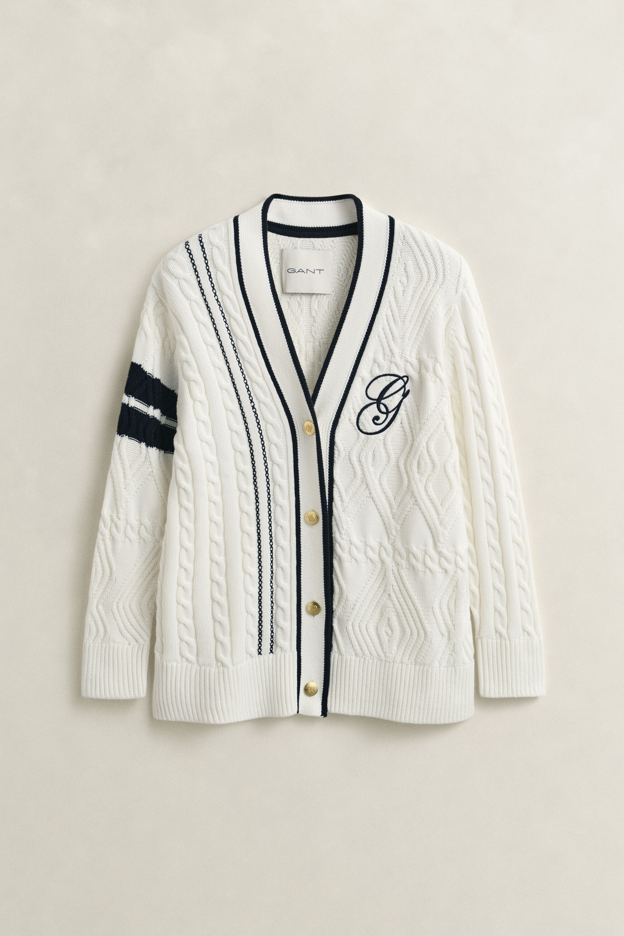 Varsity cardigan med kabelstrik
