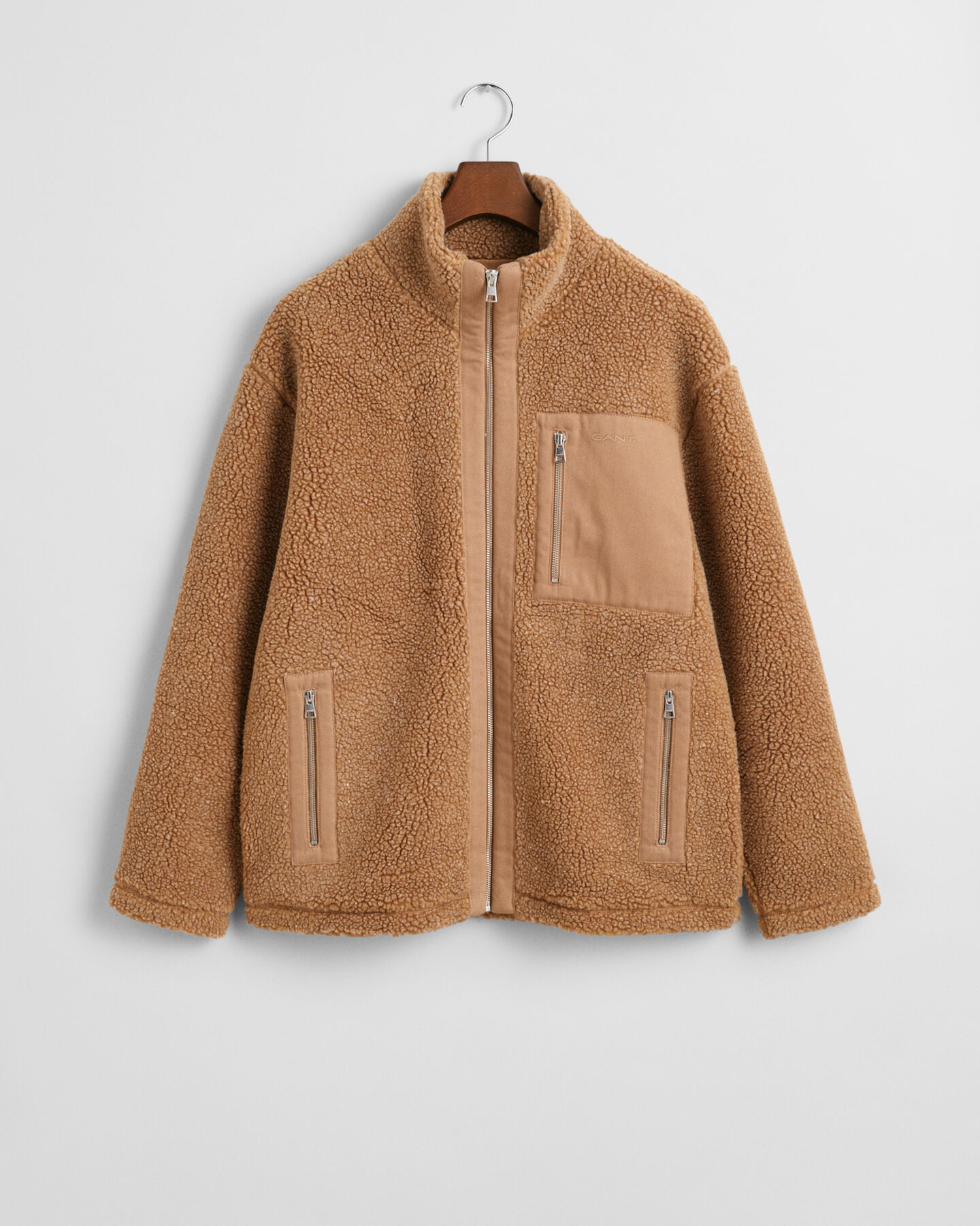 Fleece i uldblanding med blokke