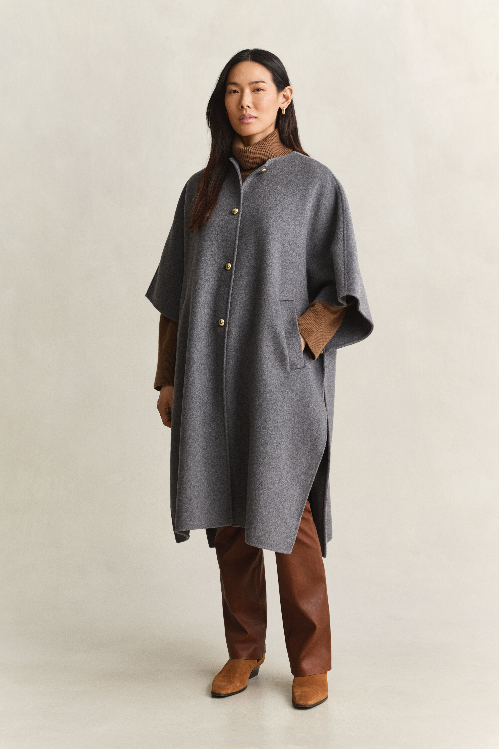 Håndsyet Cape Coat