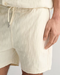 Shorts i jacquard frott&eacute;