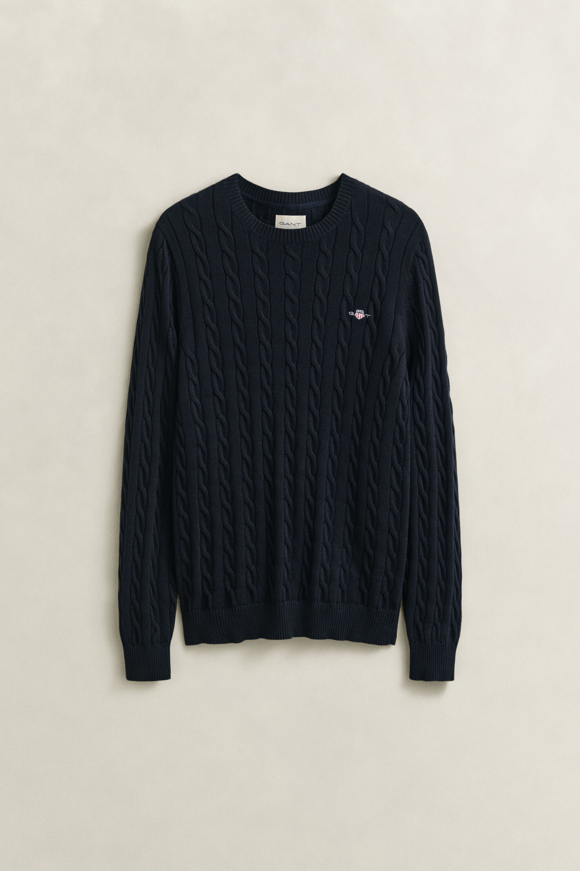 Crewneck sweater af bomuld med kabelstrik