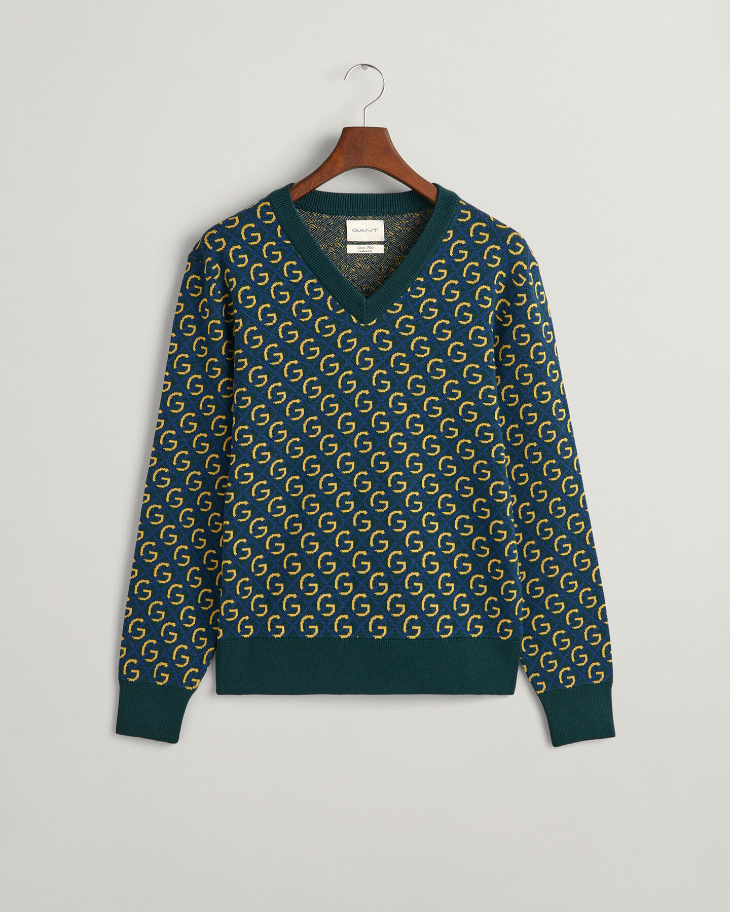 Sweater i merinould med jacquard og V-hals