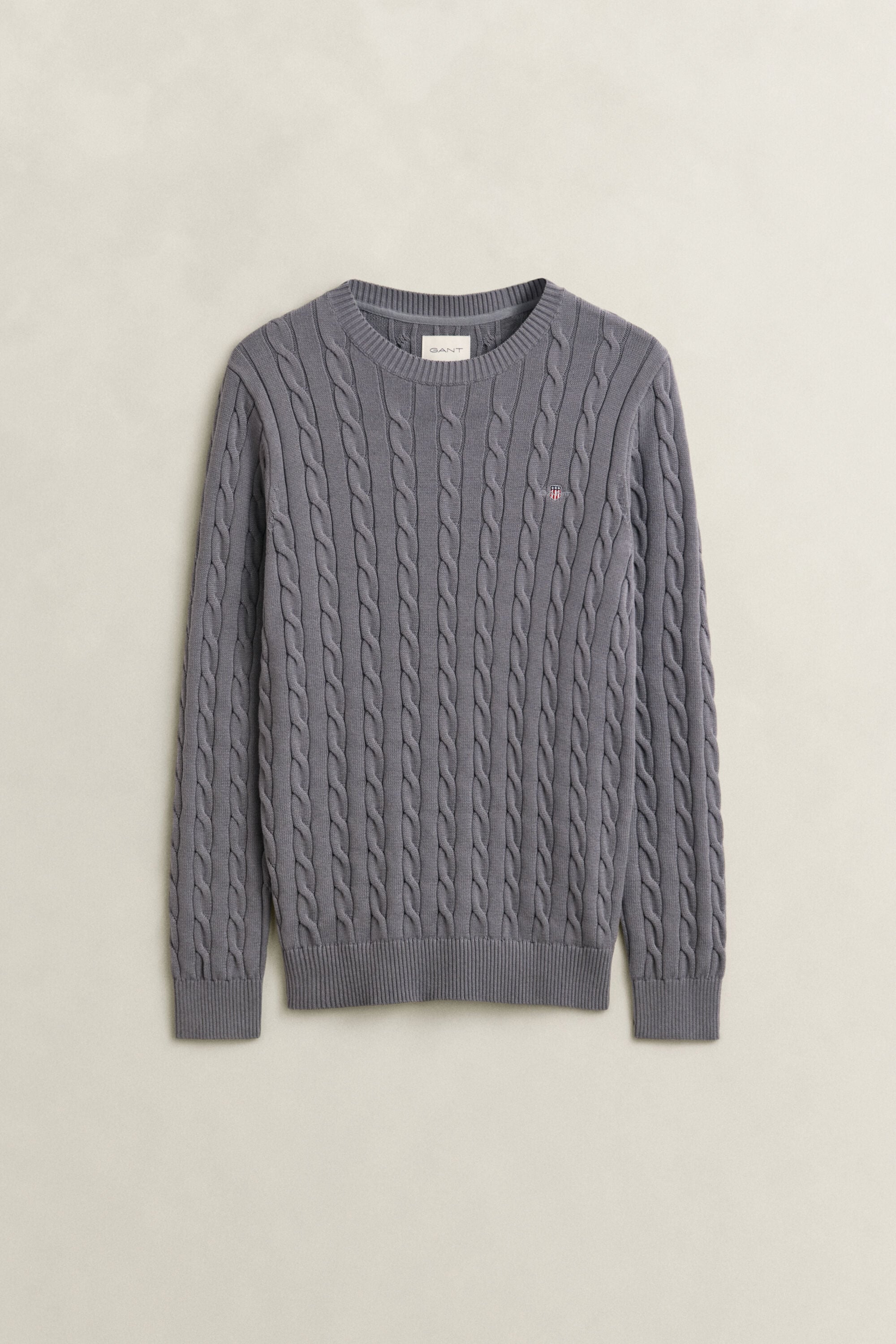Crewneck sweater af bomuld med kabelstrik