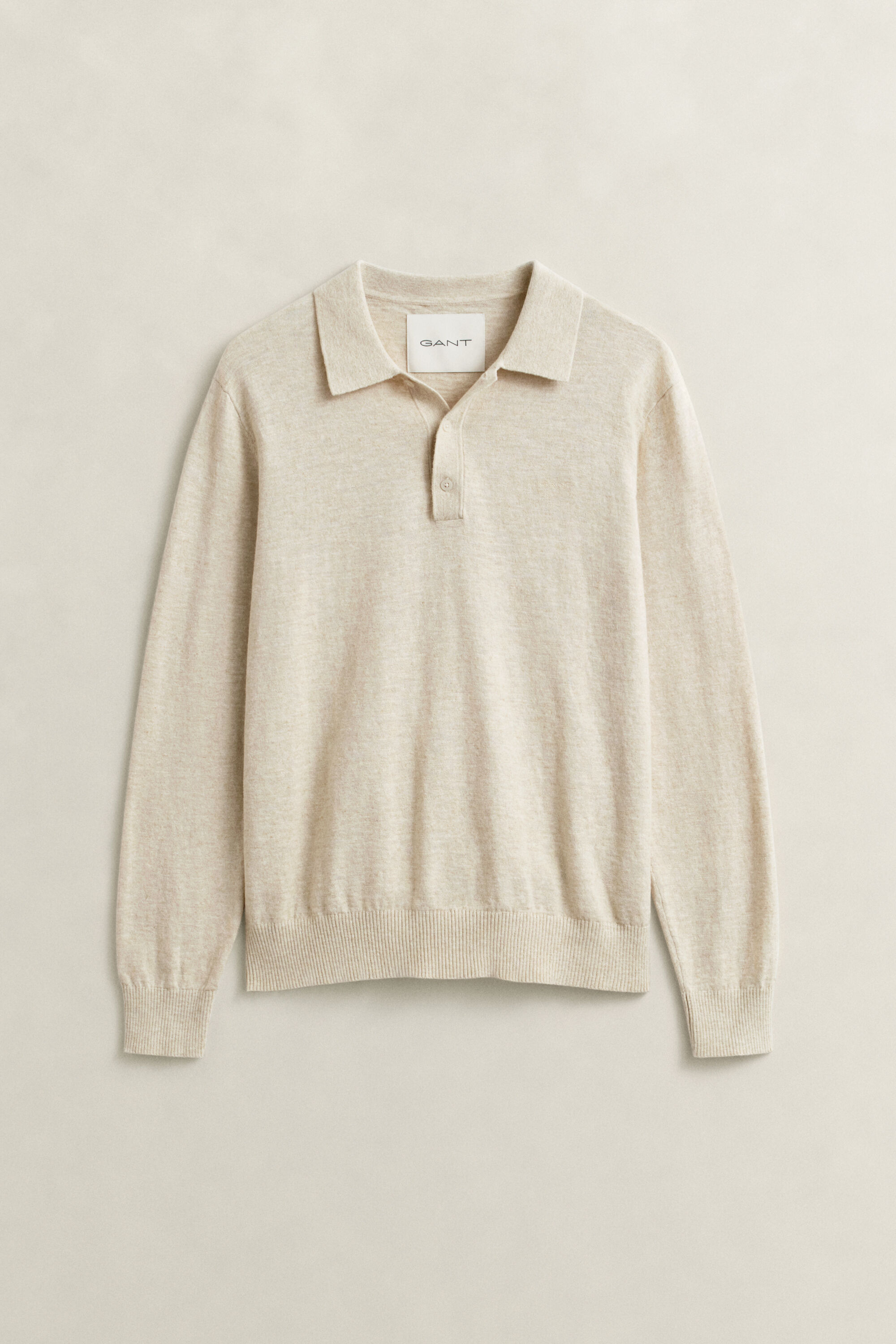 Polosweater i nopret bomuldsblanding