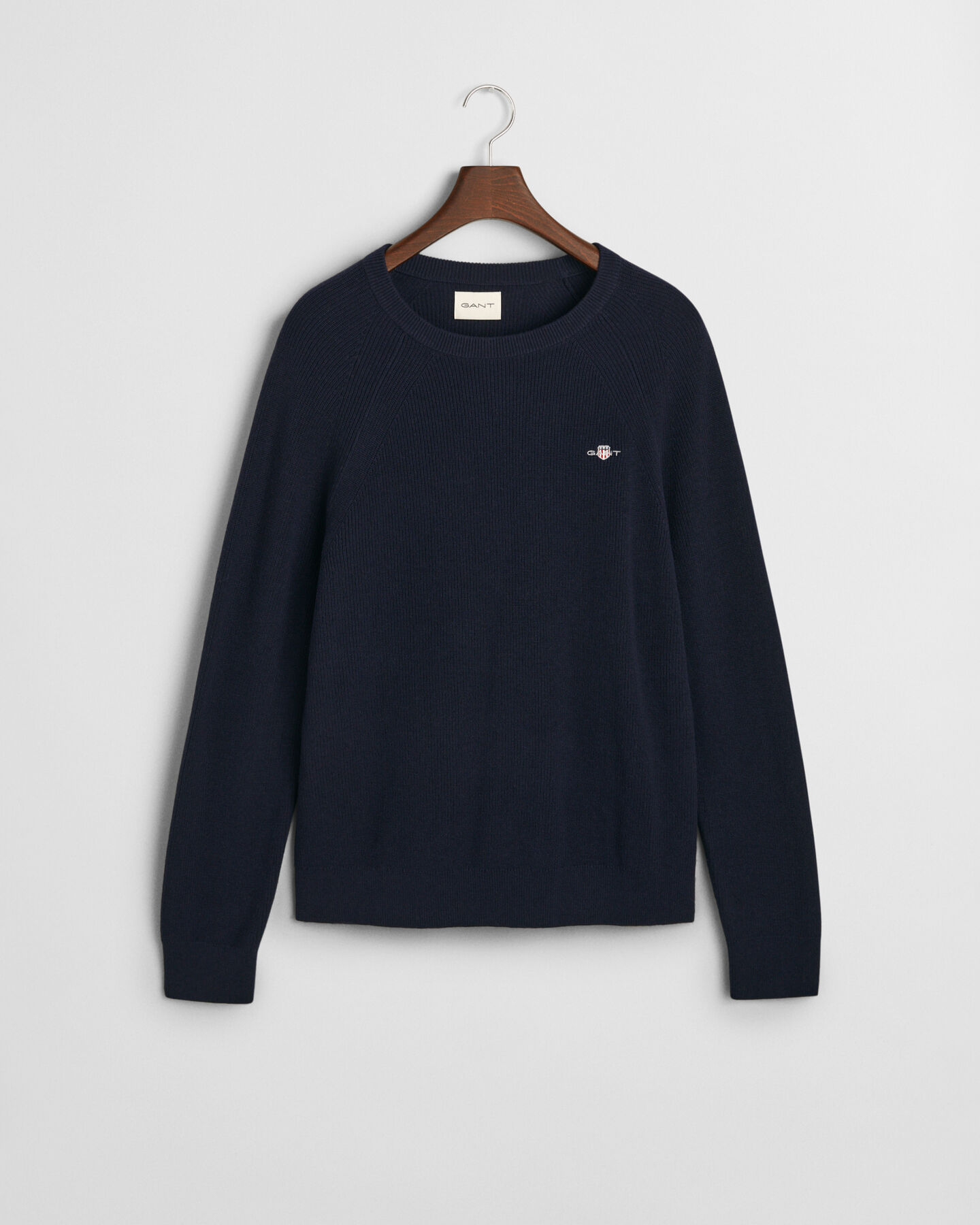 Ribstrikket crewneck sweater af bomuld og uld