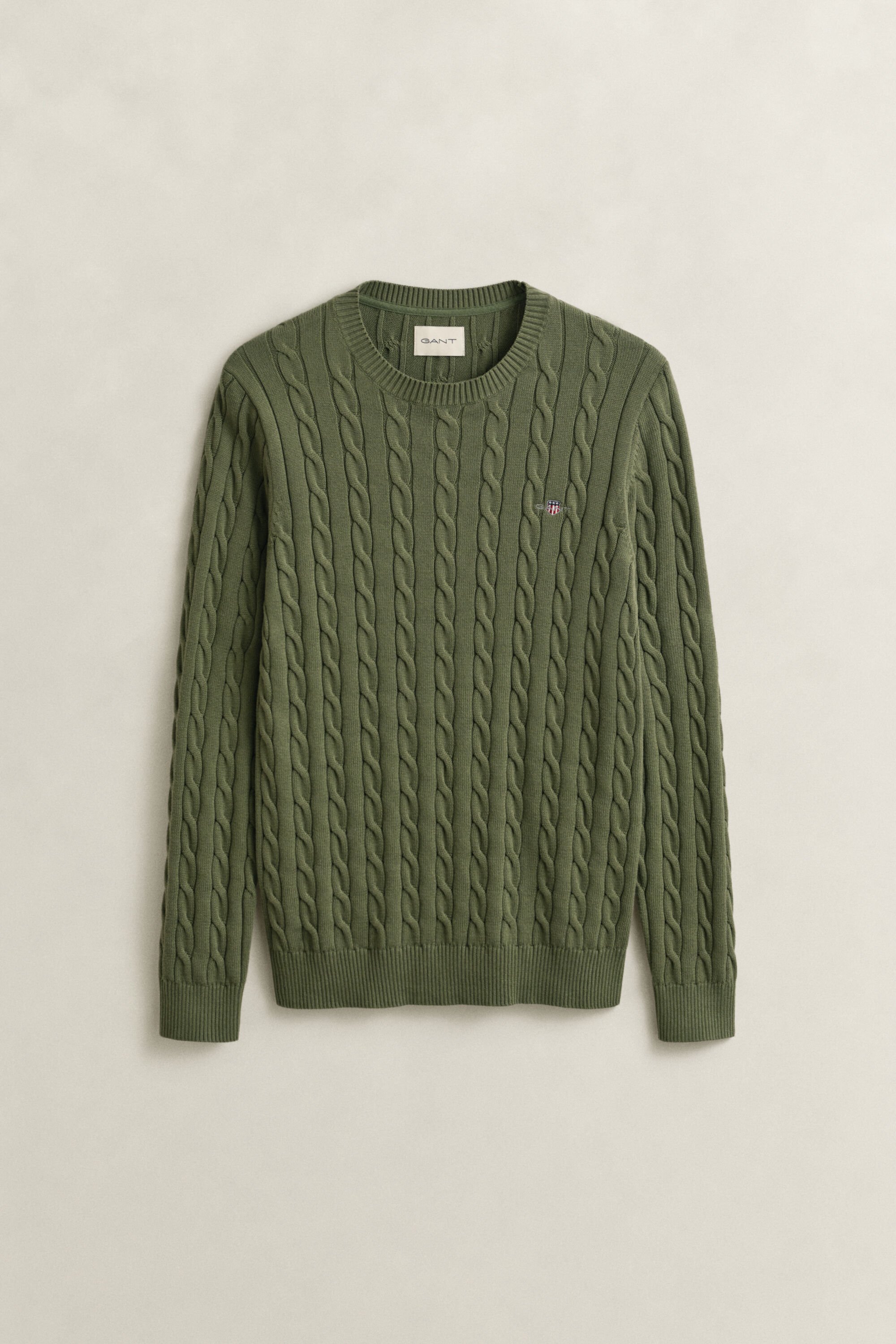 Crewneck sweater af bomuld med kabelstrik